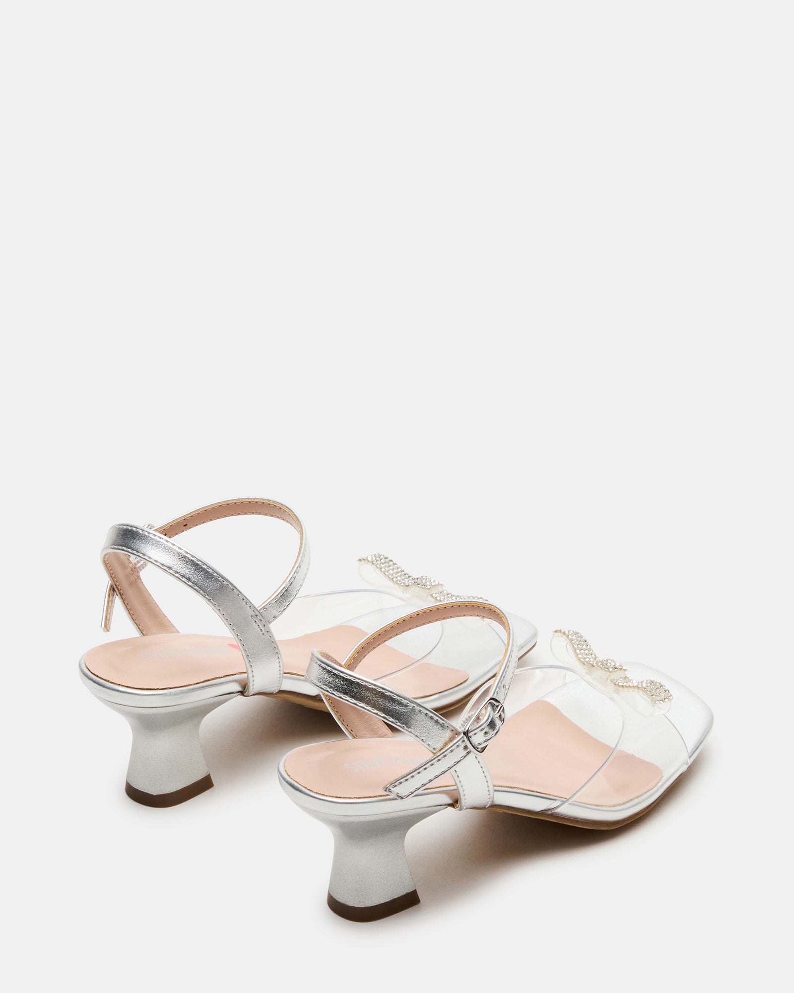 Side view of fashionable kids shoes with secure ankle strap