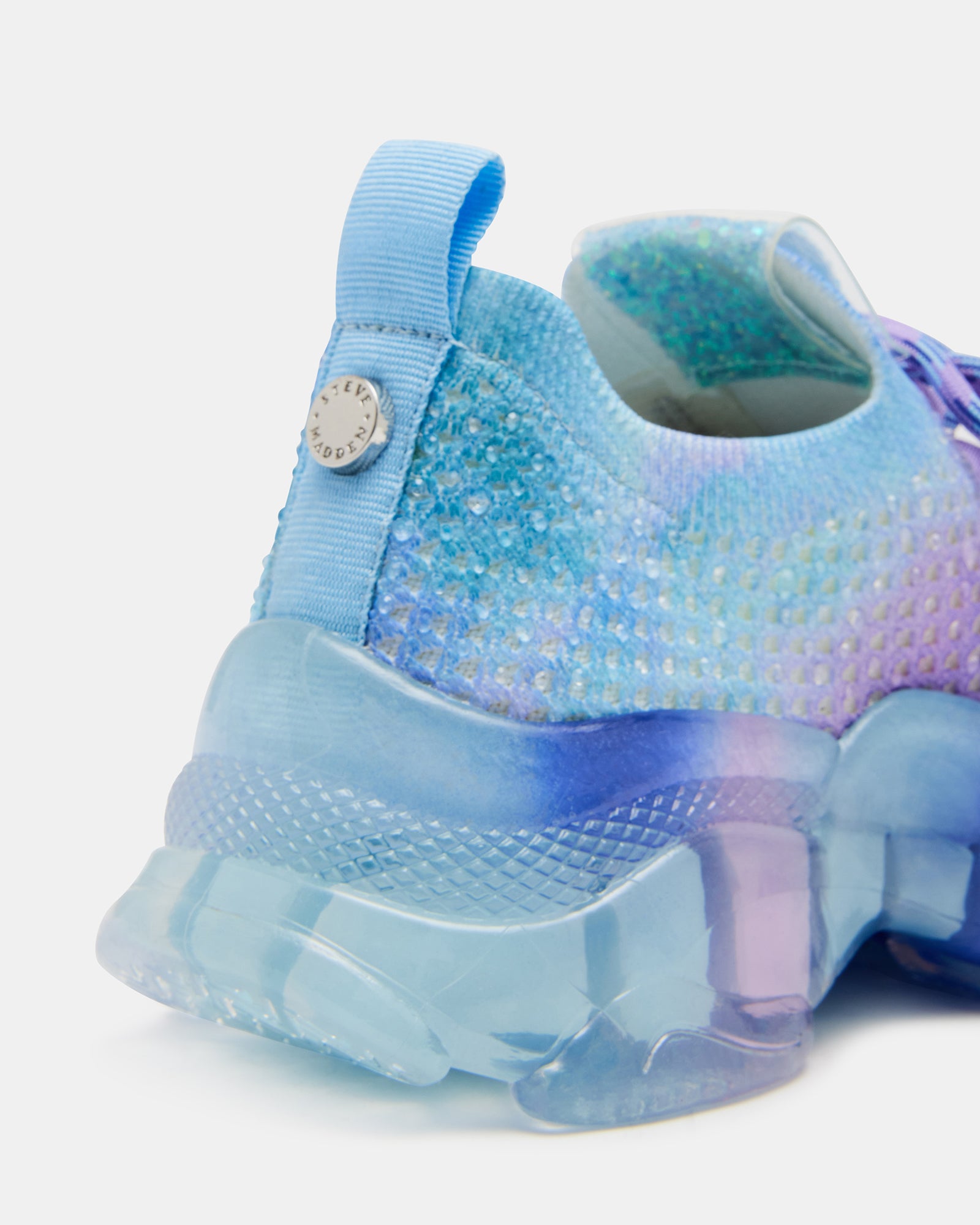 Close-up of ankle pull tab and synthetic sole for easy on/off.