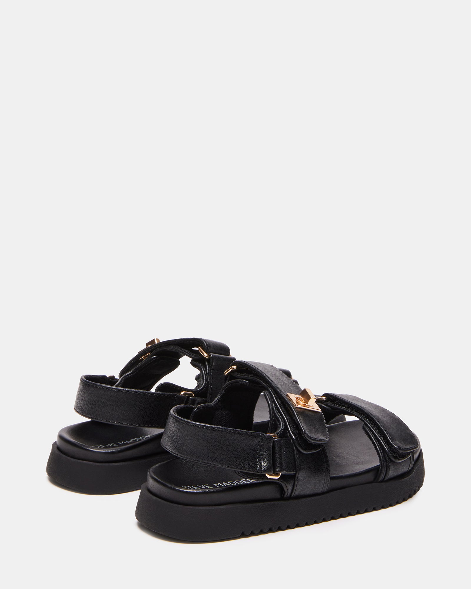 Close-up of the velcro straps on Mona Kids Sandals in Black.