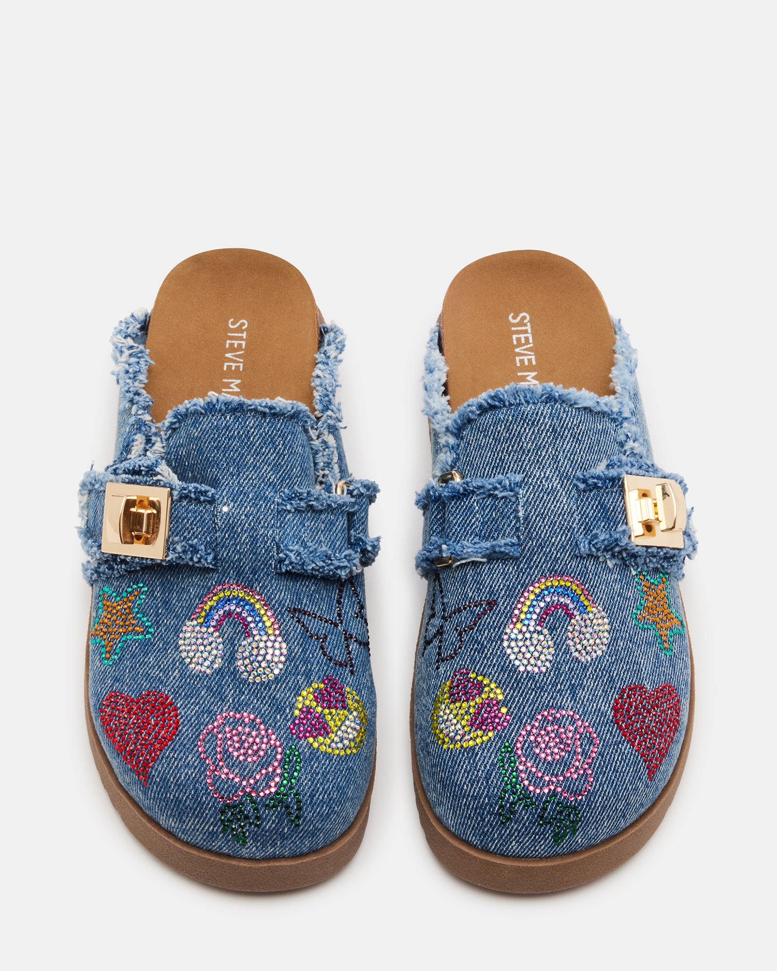 Side view of denim kids clogs with rhinestones and molded sole