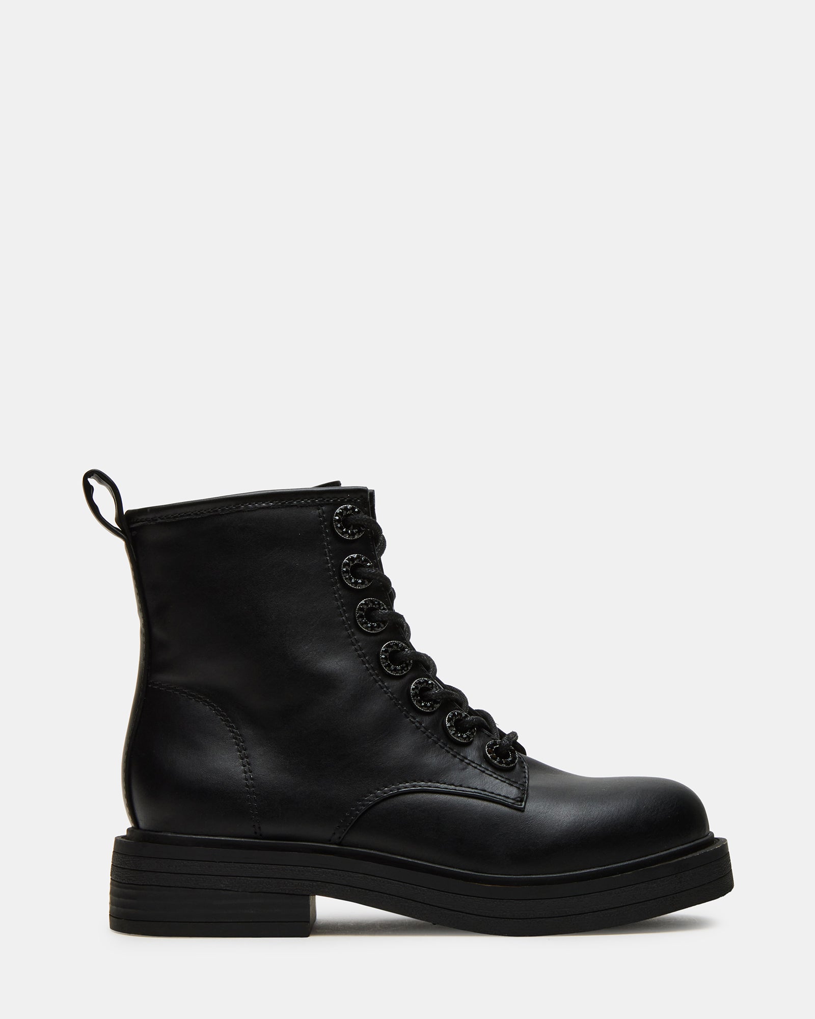 Kids wearing Nolita black combat ankle boots during outdoor play