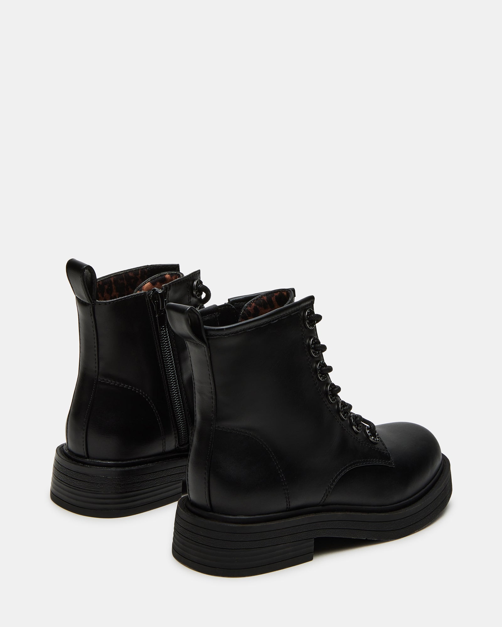 Close-up of vegan leather upper on kids combat boots