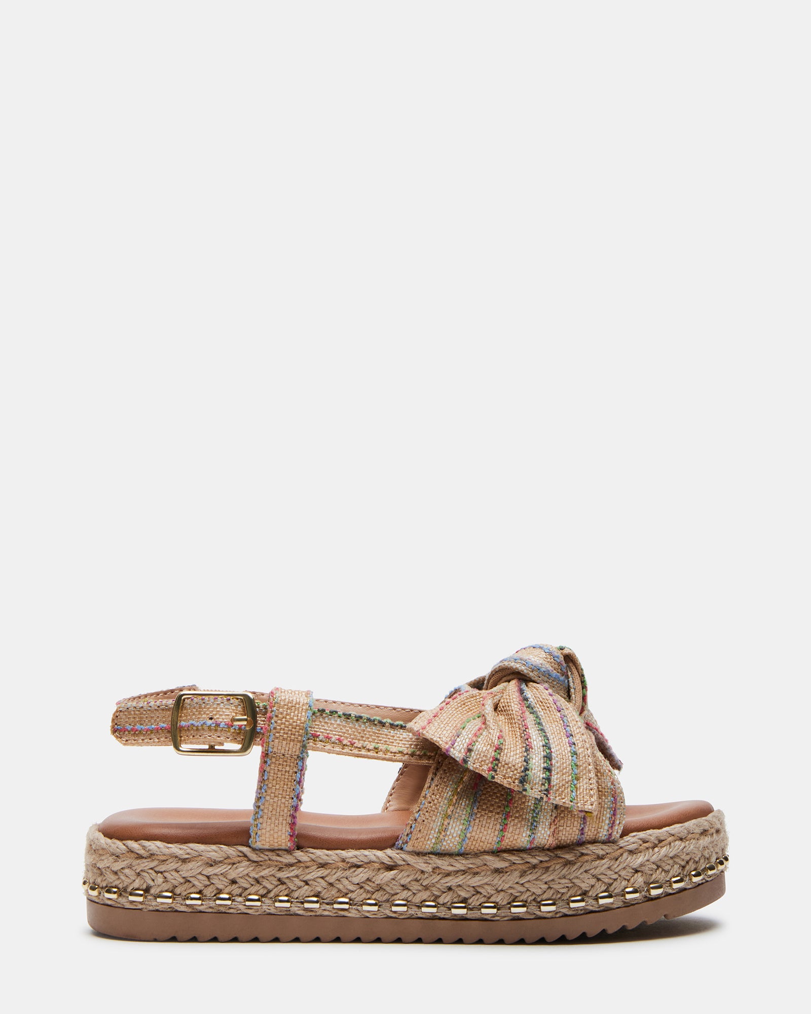 Charming kids platform espadrille sandals with bow detail on a sunny day