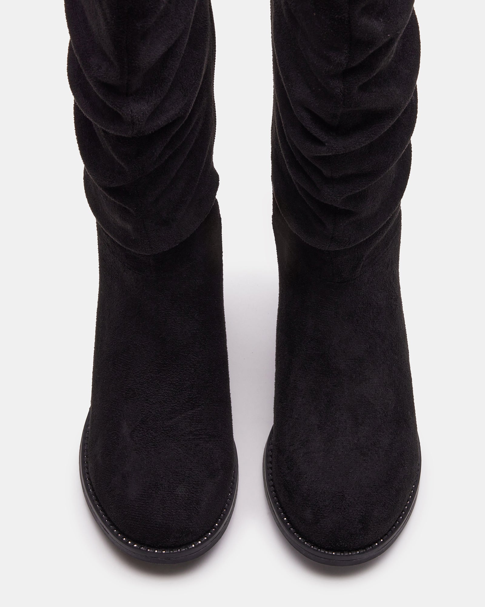 Side view of kids scrunch boots in black, ideal for fall fashion.