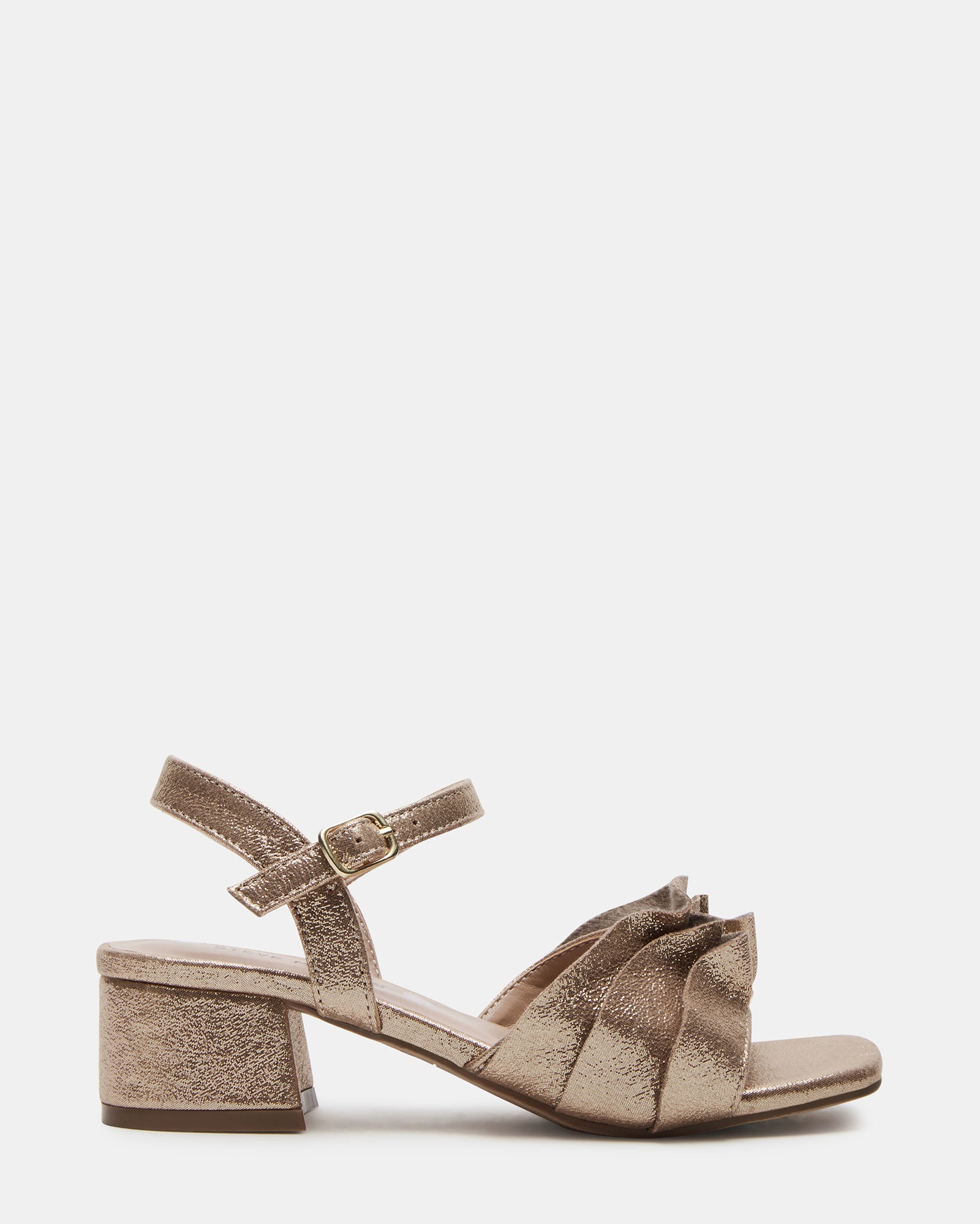 Close-up of girls dress shoes showing gold ruffle and square heel