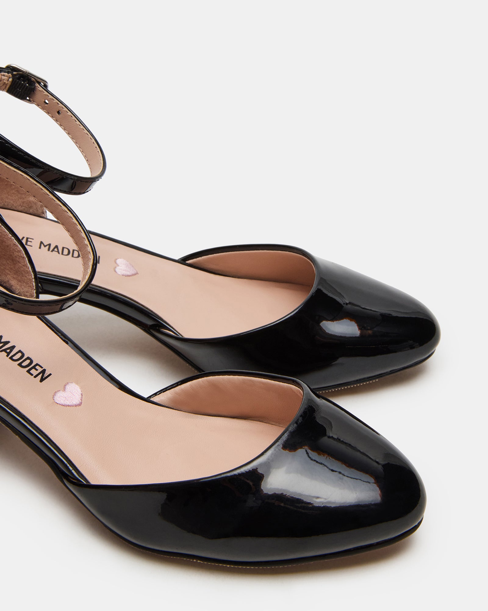 Back view highlighting heel height and comfort features for everyday school wear.