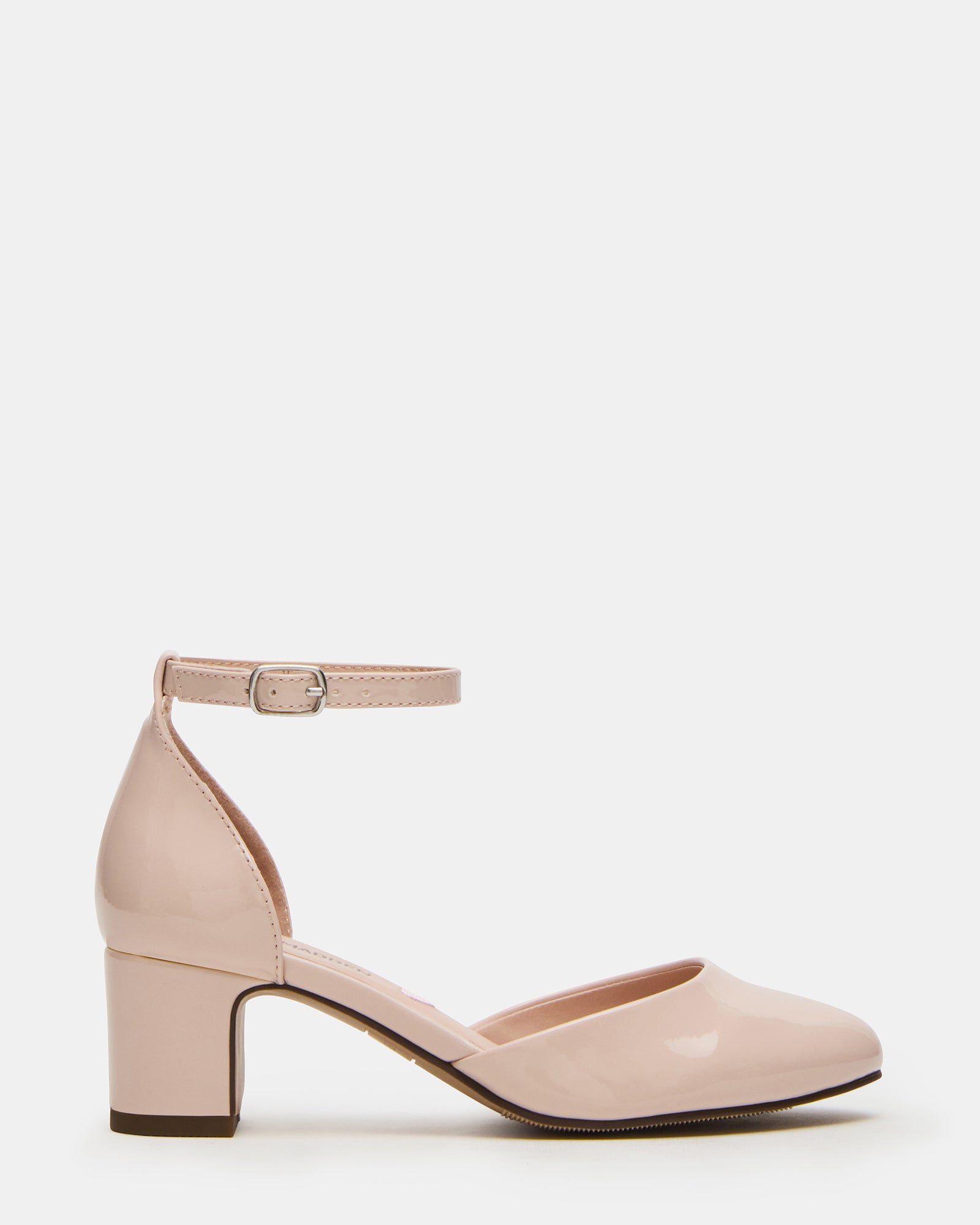 Girls blush patent dress shoes from a side angle, showing the ankle strap.