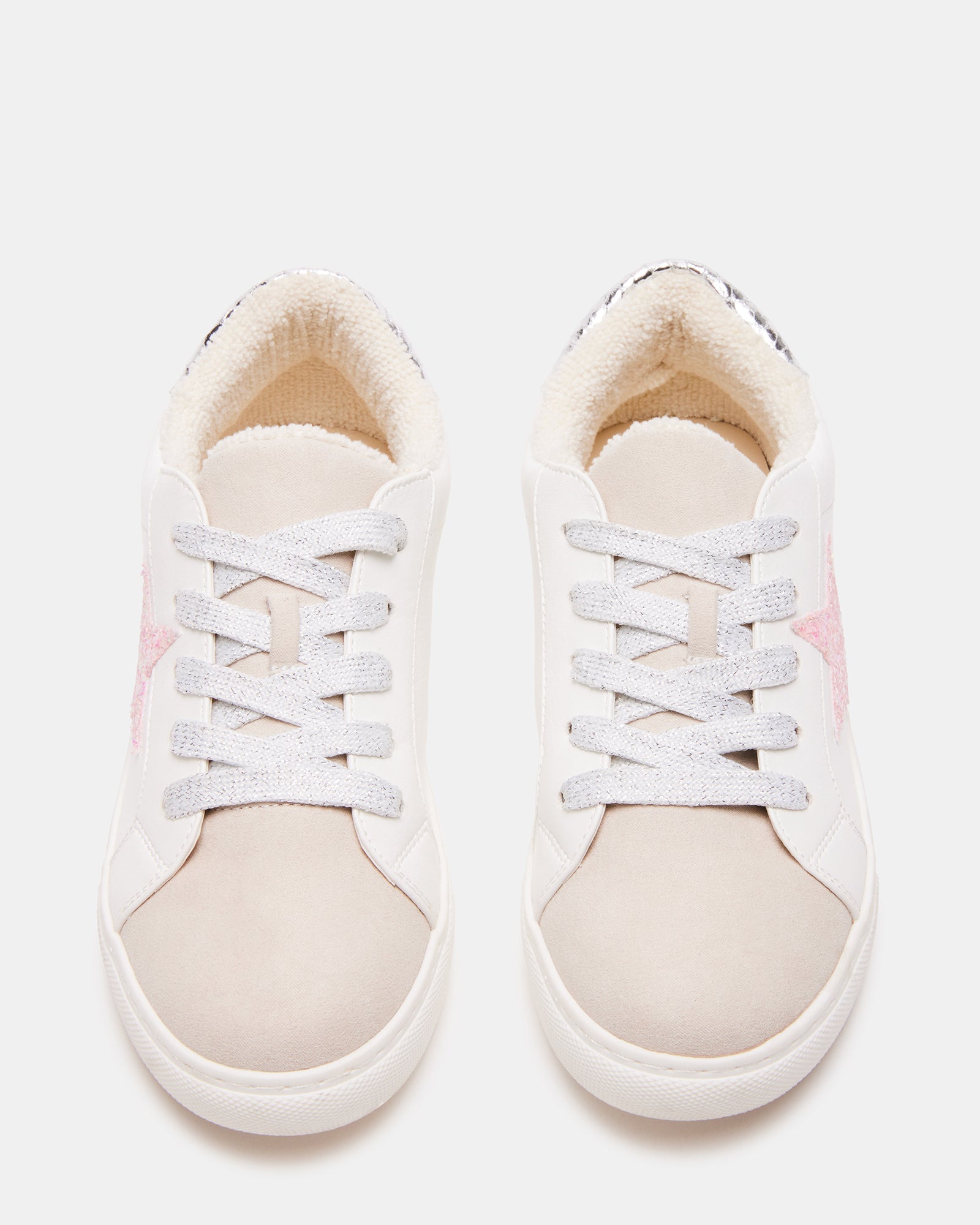 White multi sneakers on feet for a casual outfit