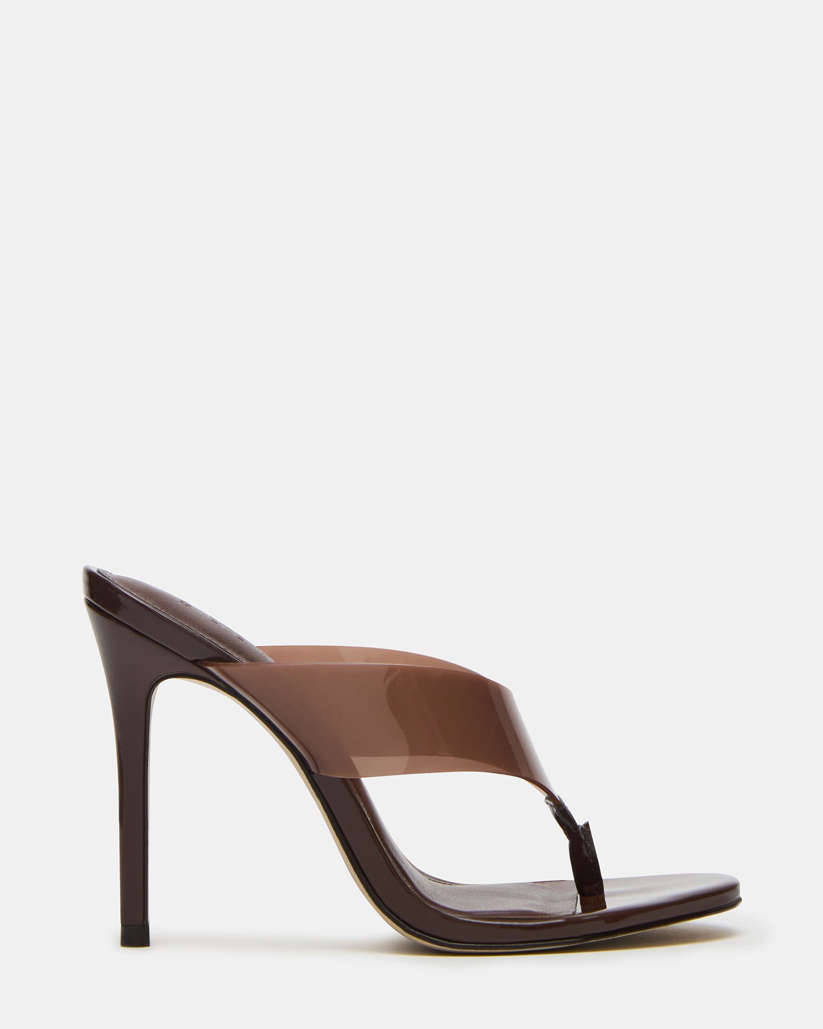 Close-up of elegant thong-heeled mules in brown, showcasing design details.