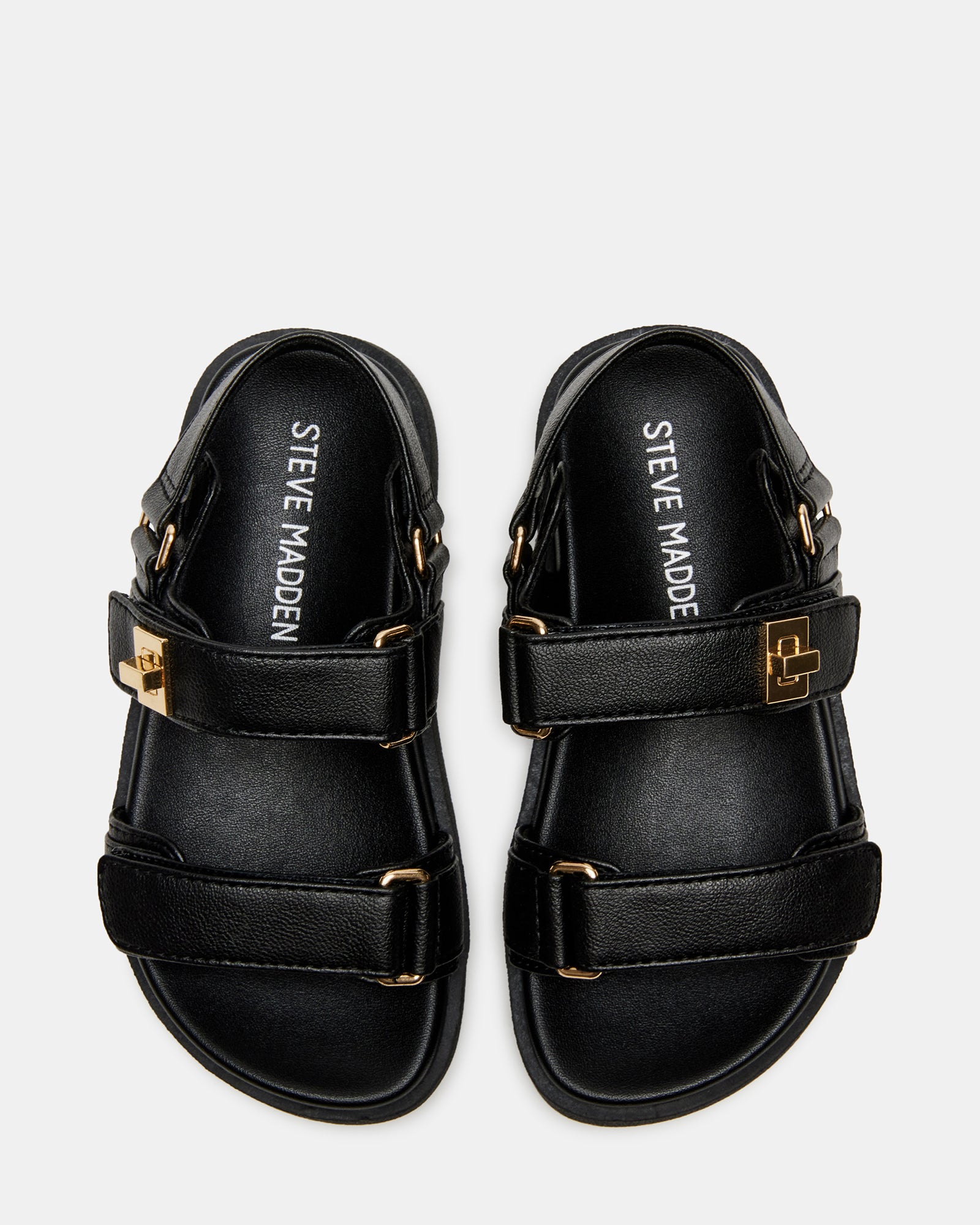 Side view of Mona black toddler sandals showing slingback strap and flatform heel