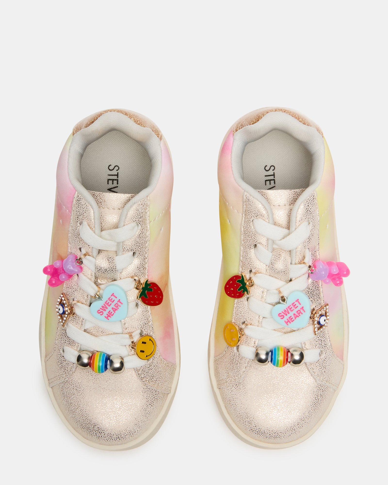 Side view of Poet Pastel toddler sneakers worn during an outdoor stroll