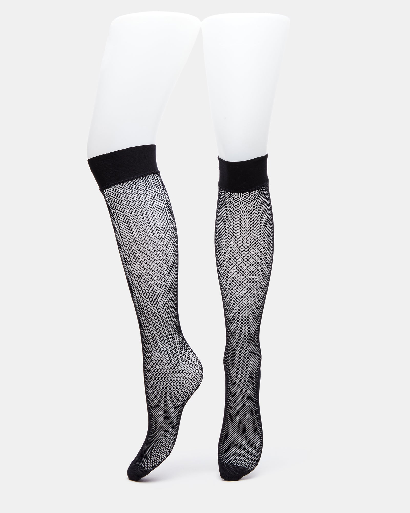 Close-up of fishnet knee high socks showing reinforced toe detail