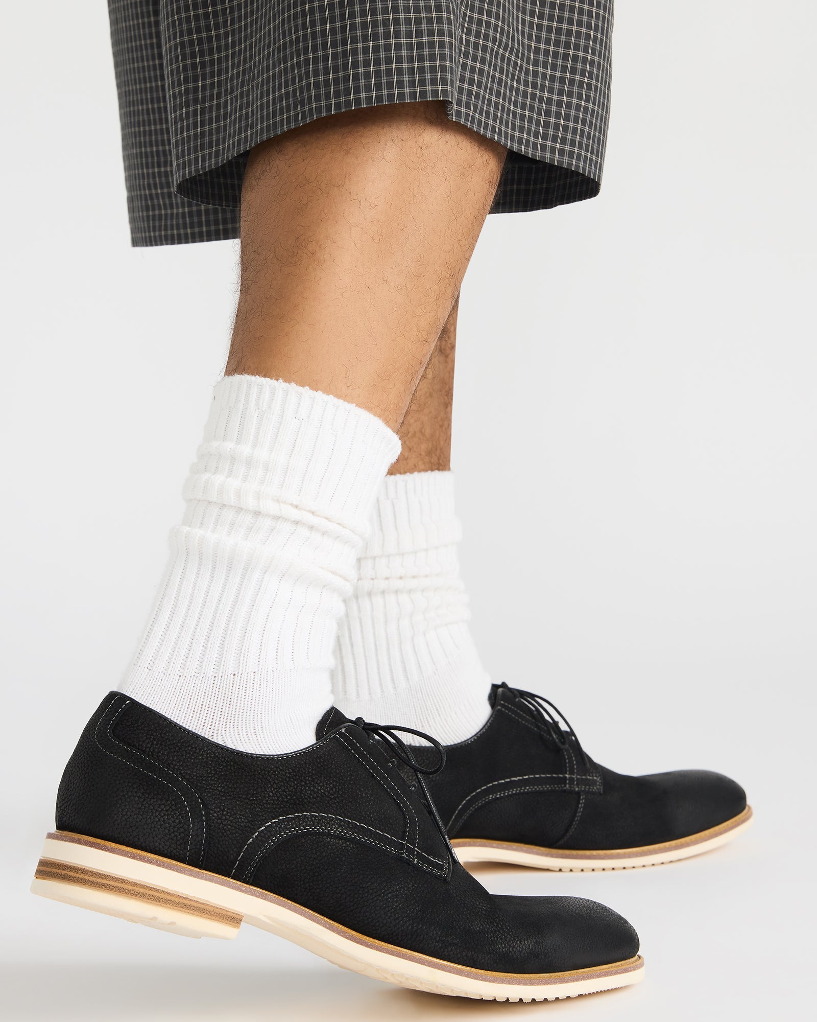 Top view of stylish mens dress shoes in black nubuck leather.