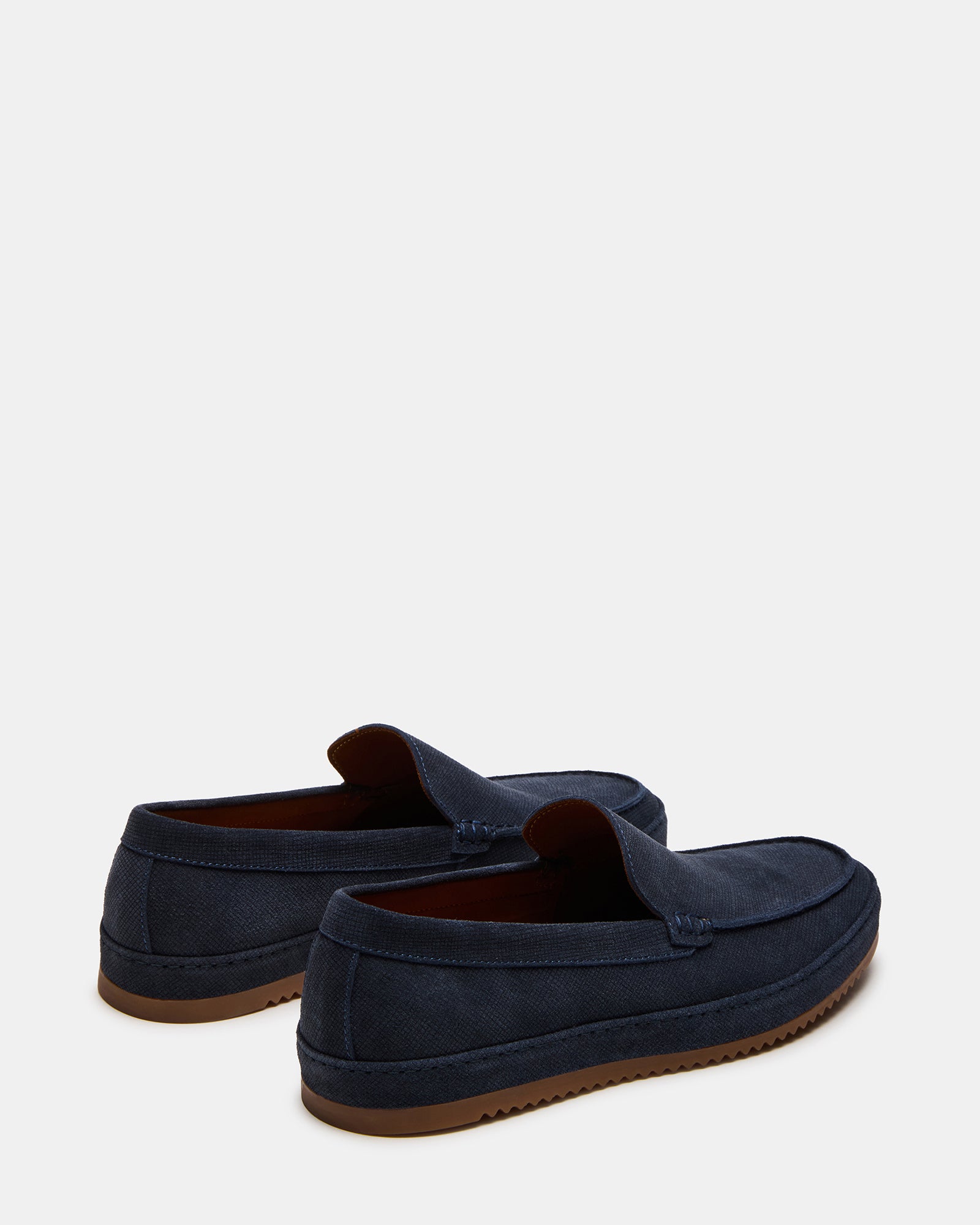 Side view of comfortable mens loafers with rubber sole and suede upper