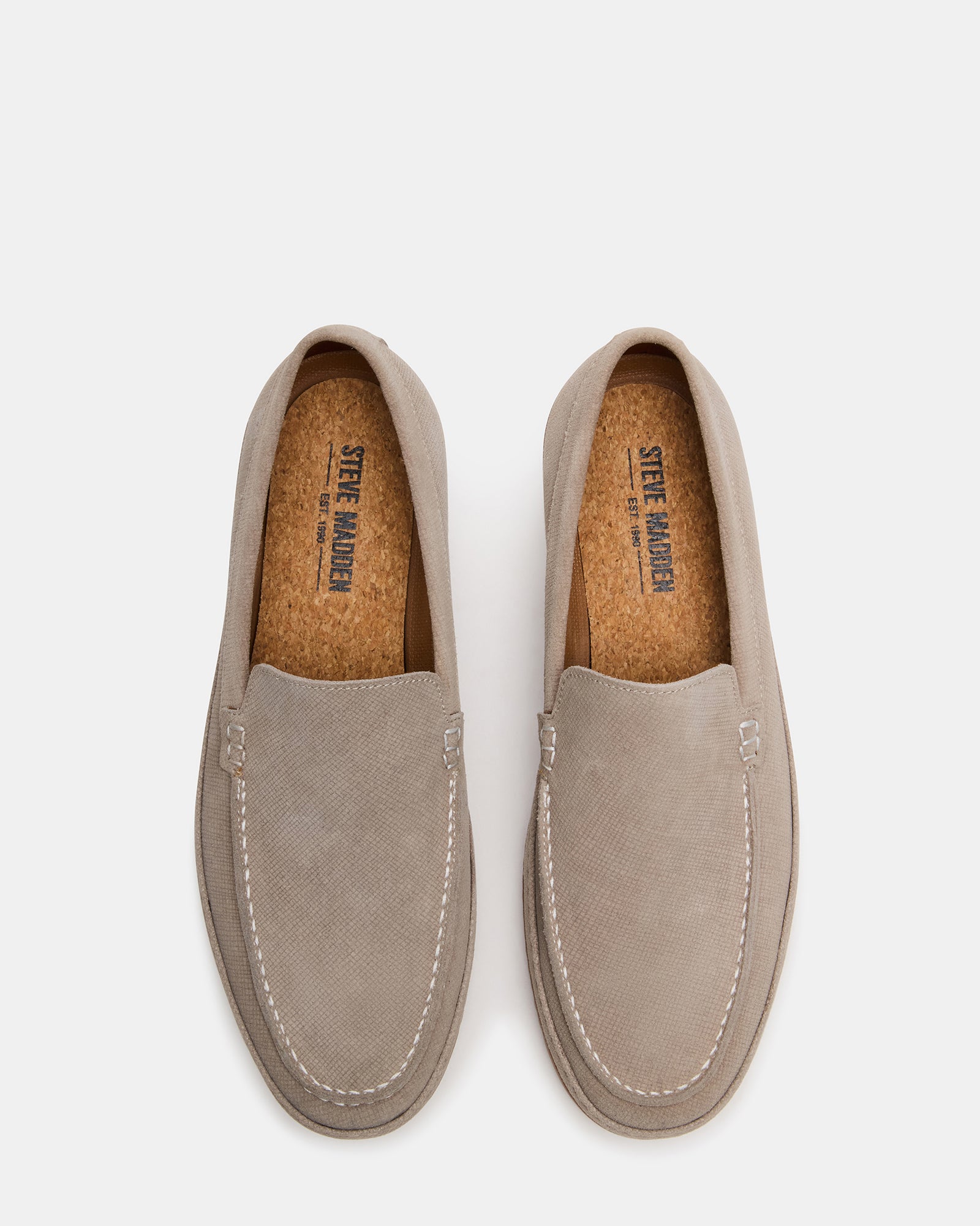 Close-up of Arrozza suede penny loafers highlighting textured brown suede