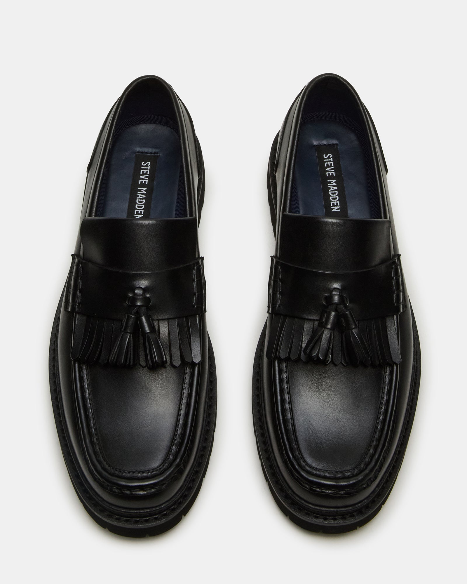 Side view of mens black loafers, perfect for business and casual wear.
