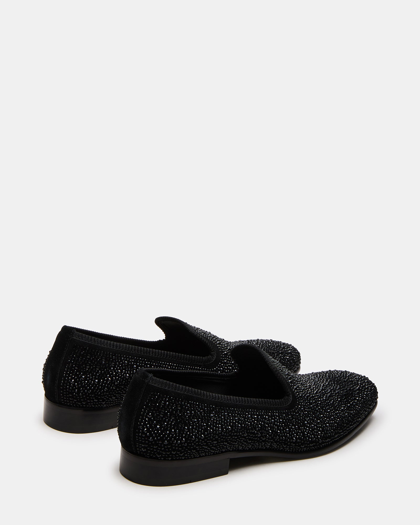 Close-up of Bannoch suede loafers, featuring rhinestones and a comfortable rubber sole.