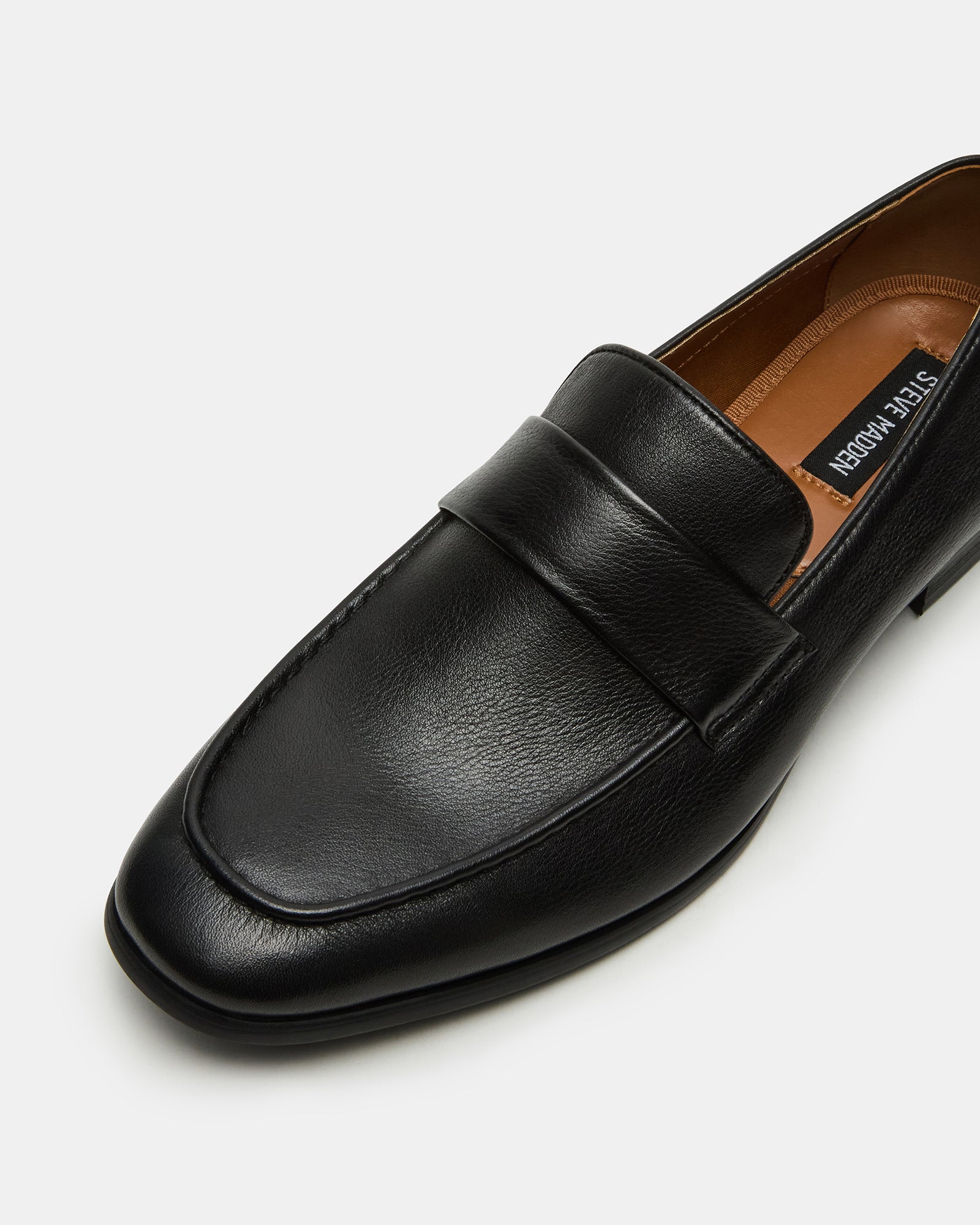 Close-up of the slip-on dress shoes premium leather texture