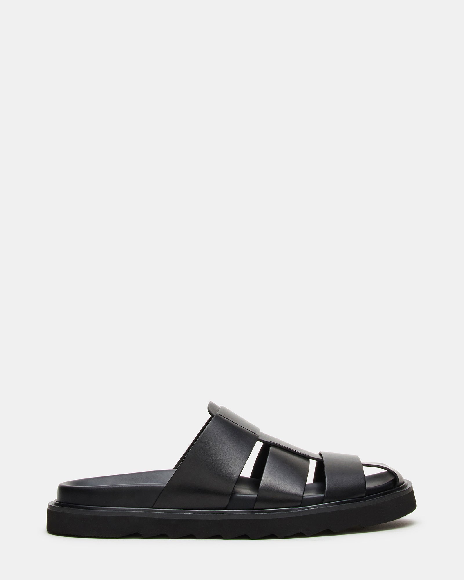 Blazet fisherman sandals on a wooden deck, showcasing leather texture