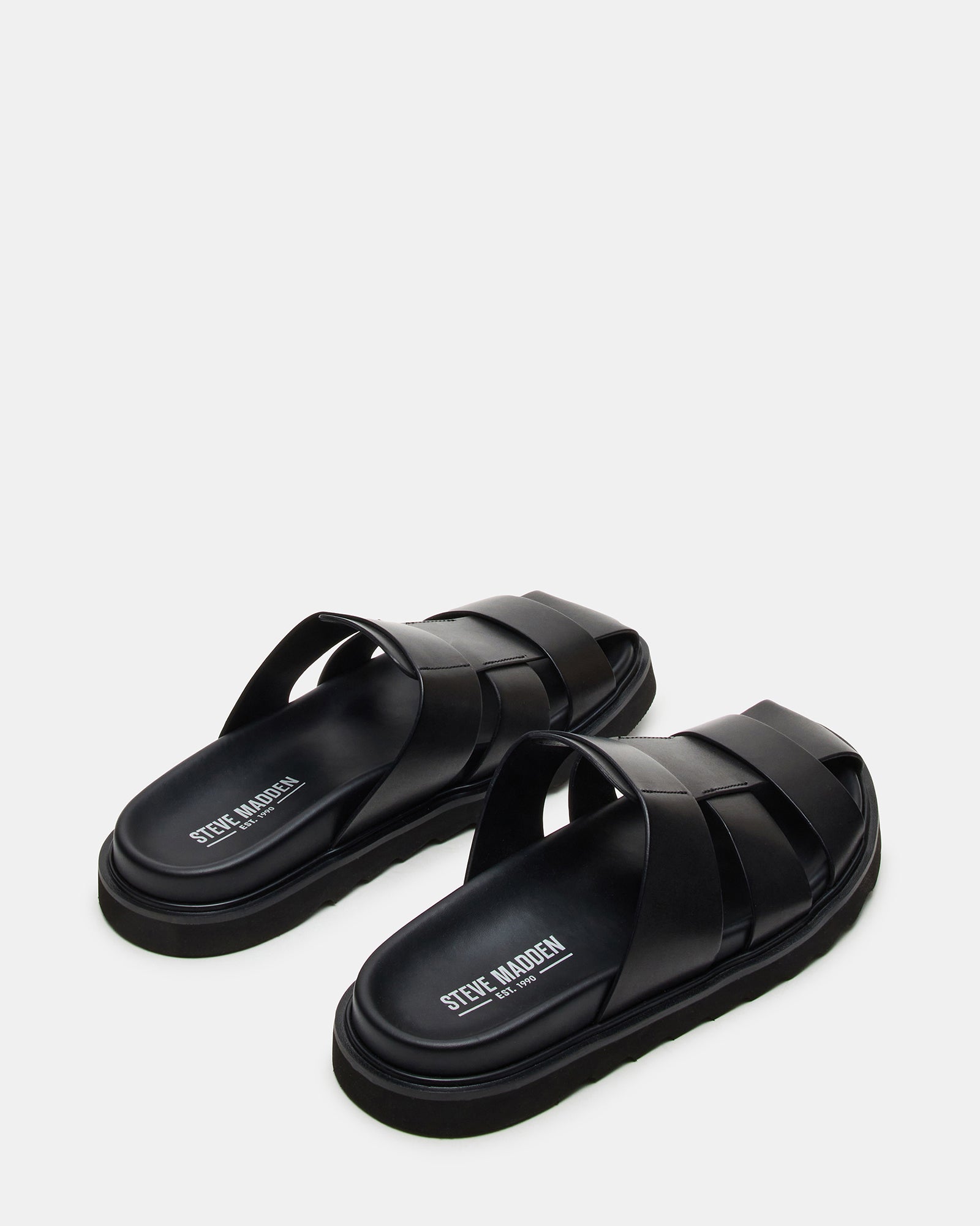 Side view of black leather sandals highlighting comfort design