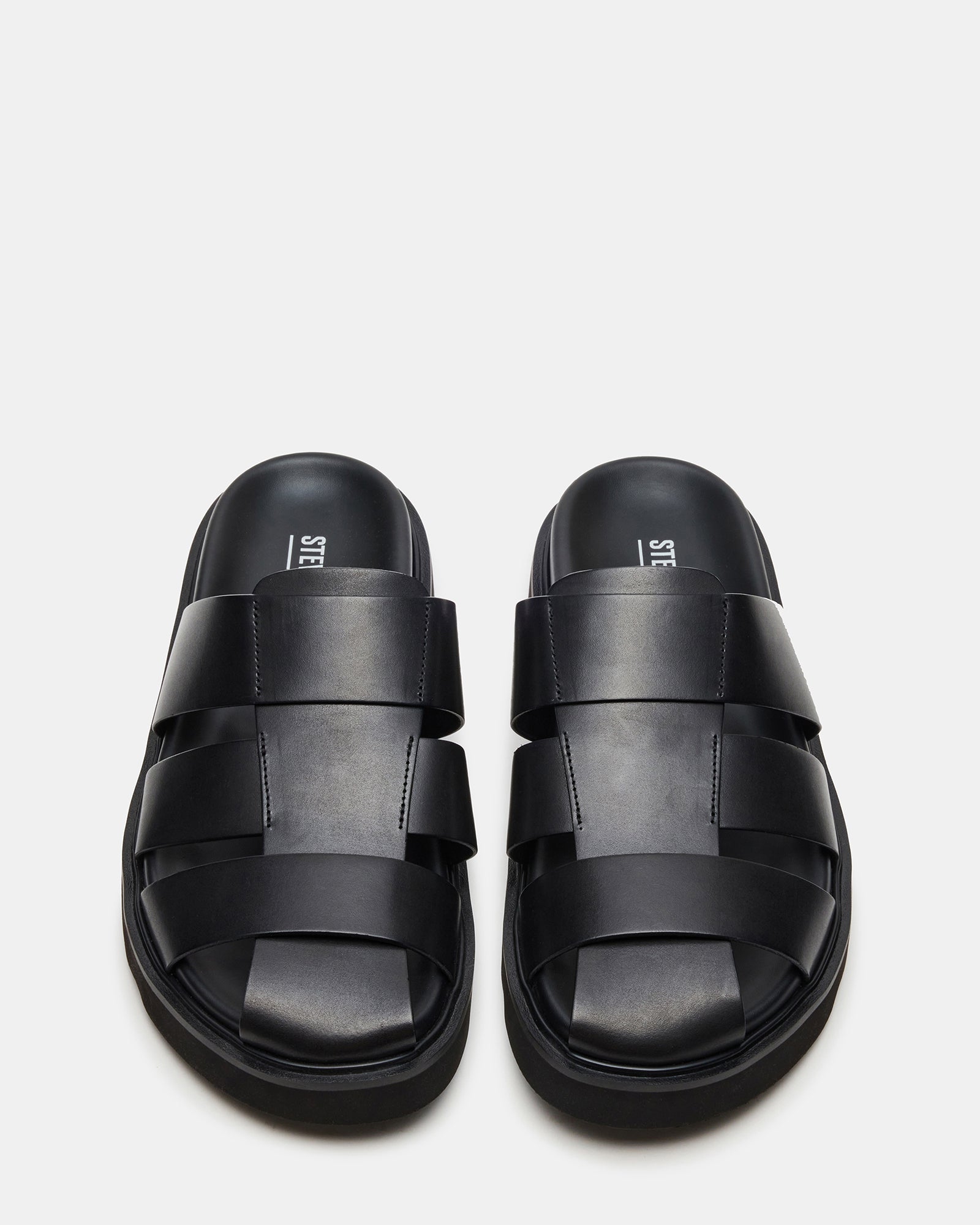 Blazet fisherman sandals on a wooden deck, showcasing leather texture