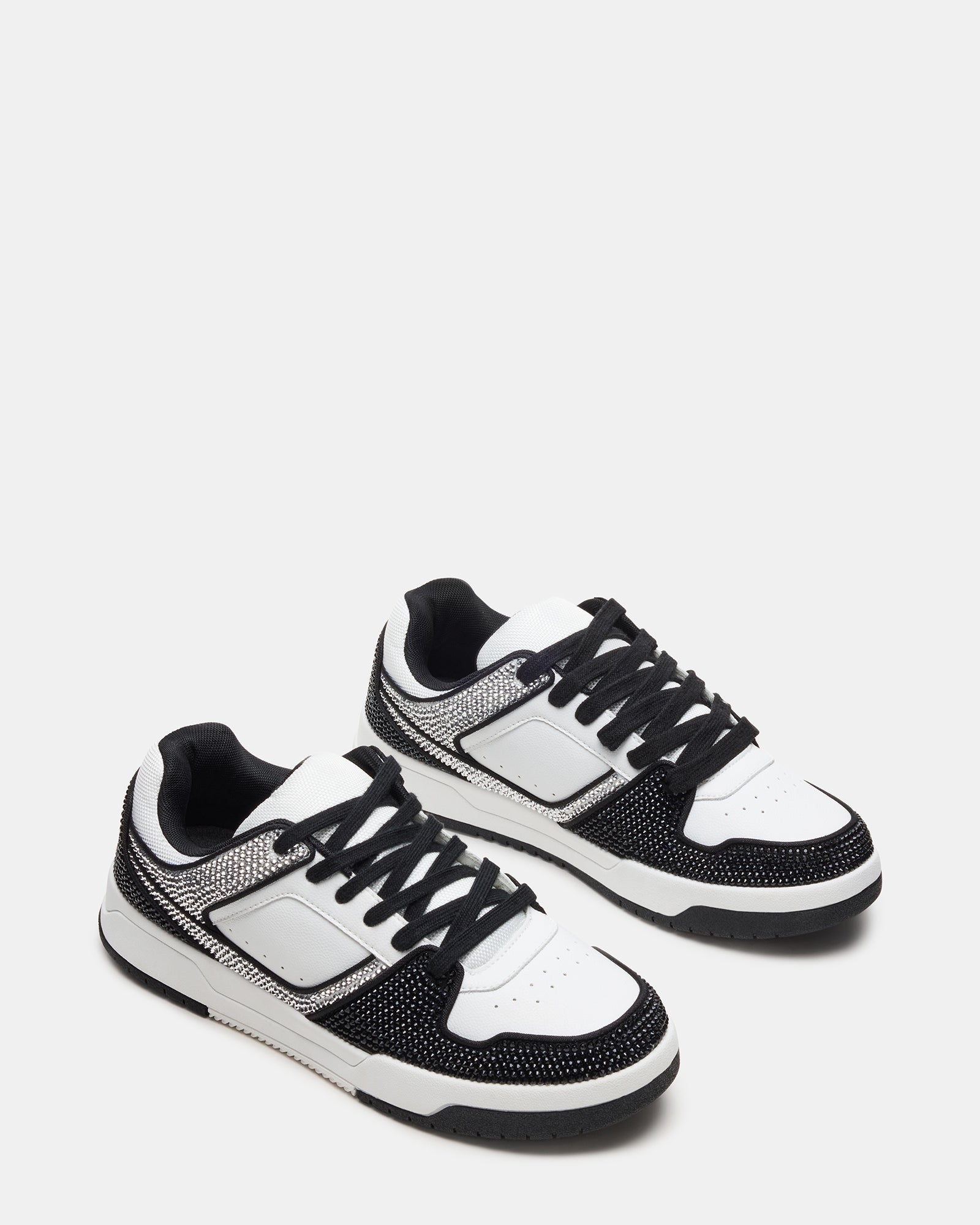 White sneakers styled with jeans for a casual, everyday look