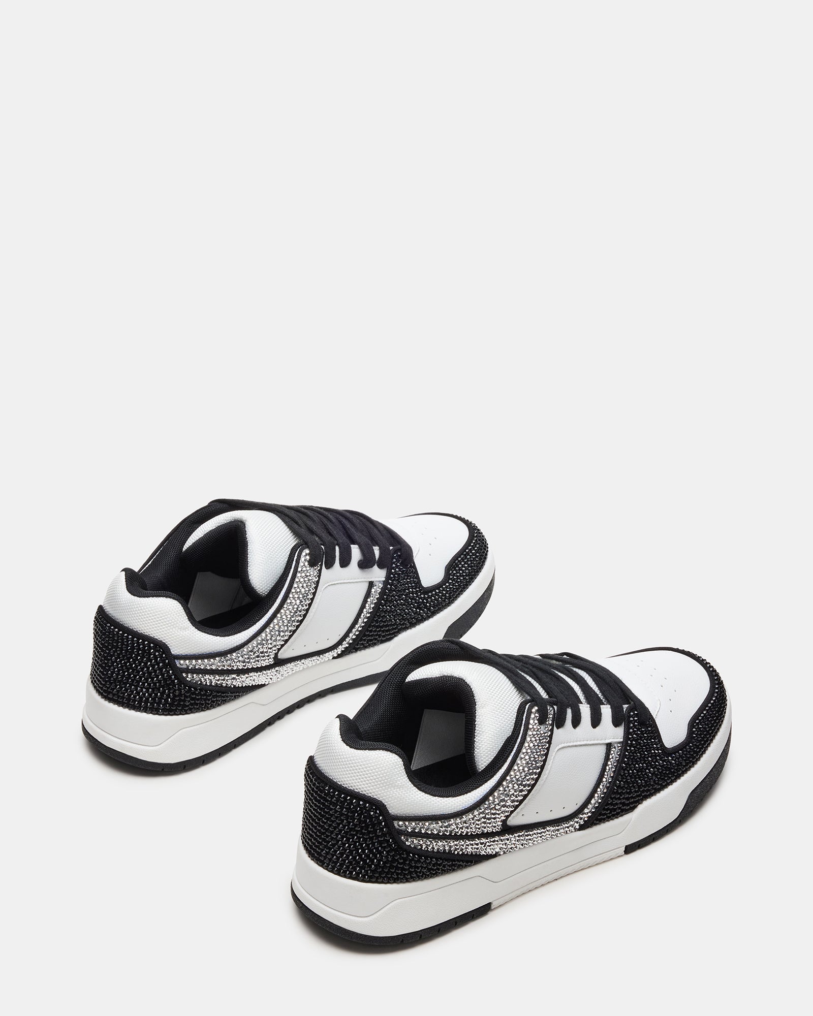 White sneakers styled with jeans for a casual, everyday look