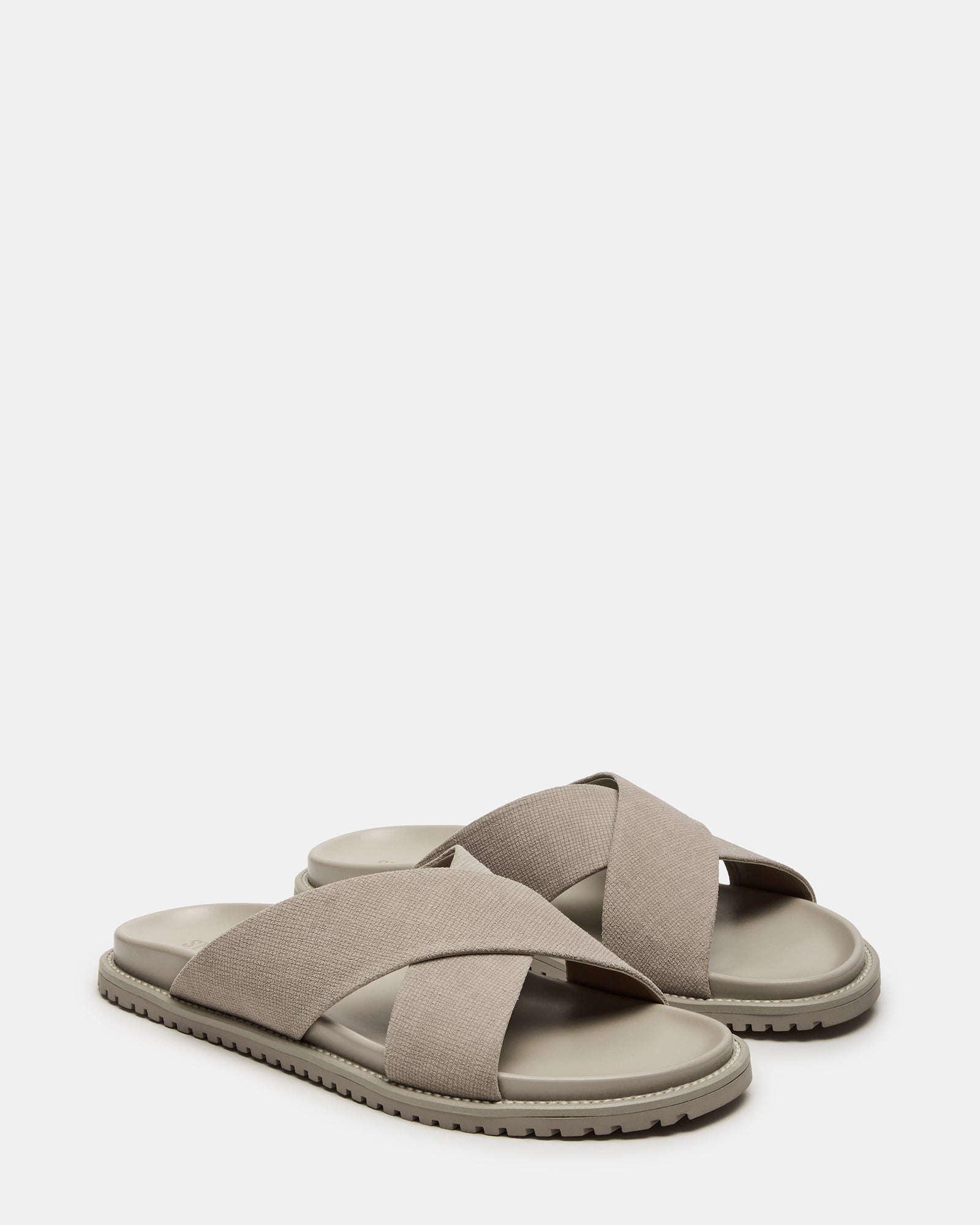 Side view of womens sandals showcasing the suede material and slip-on style.