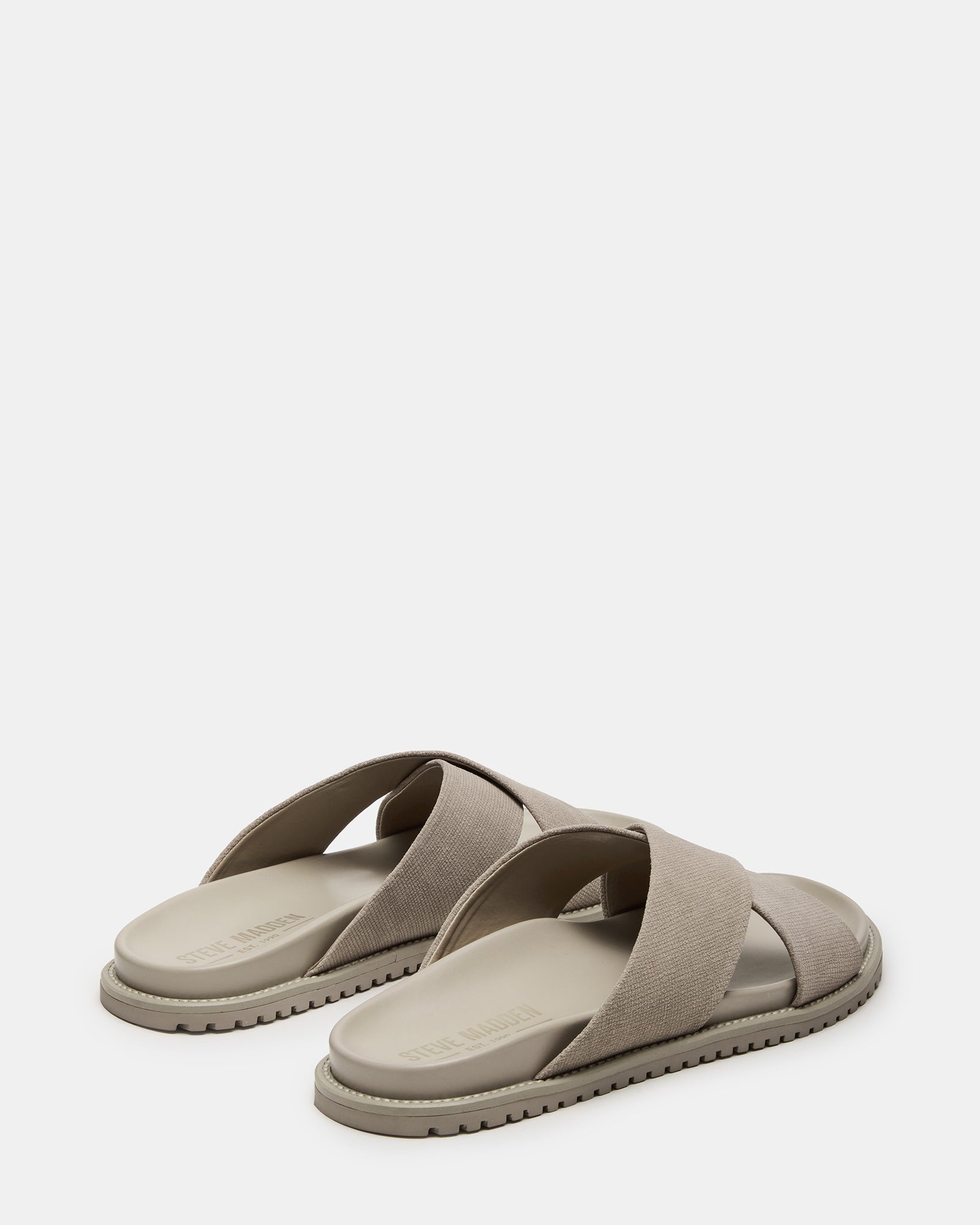 Side view of womens sandals showcasing the suede material and slip-on style.