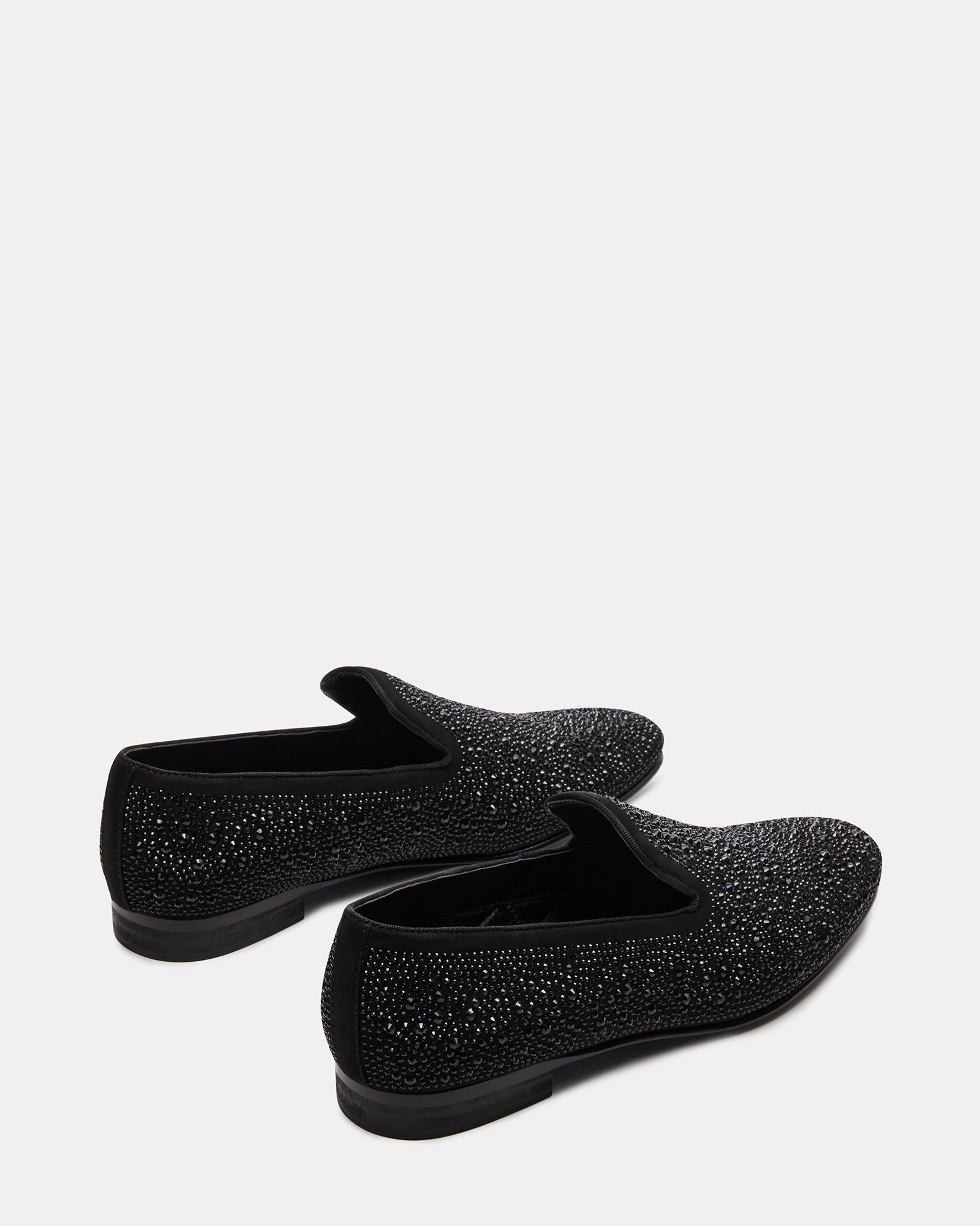 Side view of loafers with rhinestones on a styled outfit for brunch