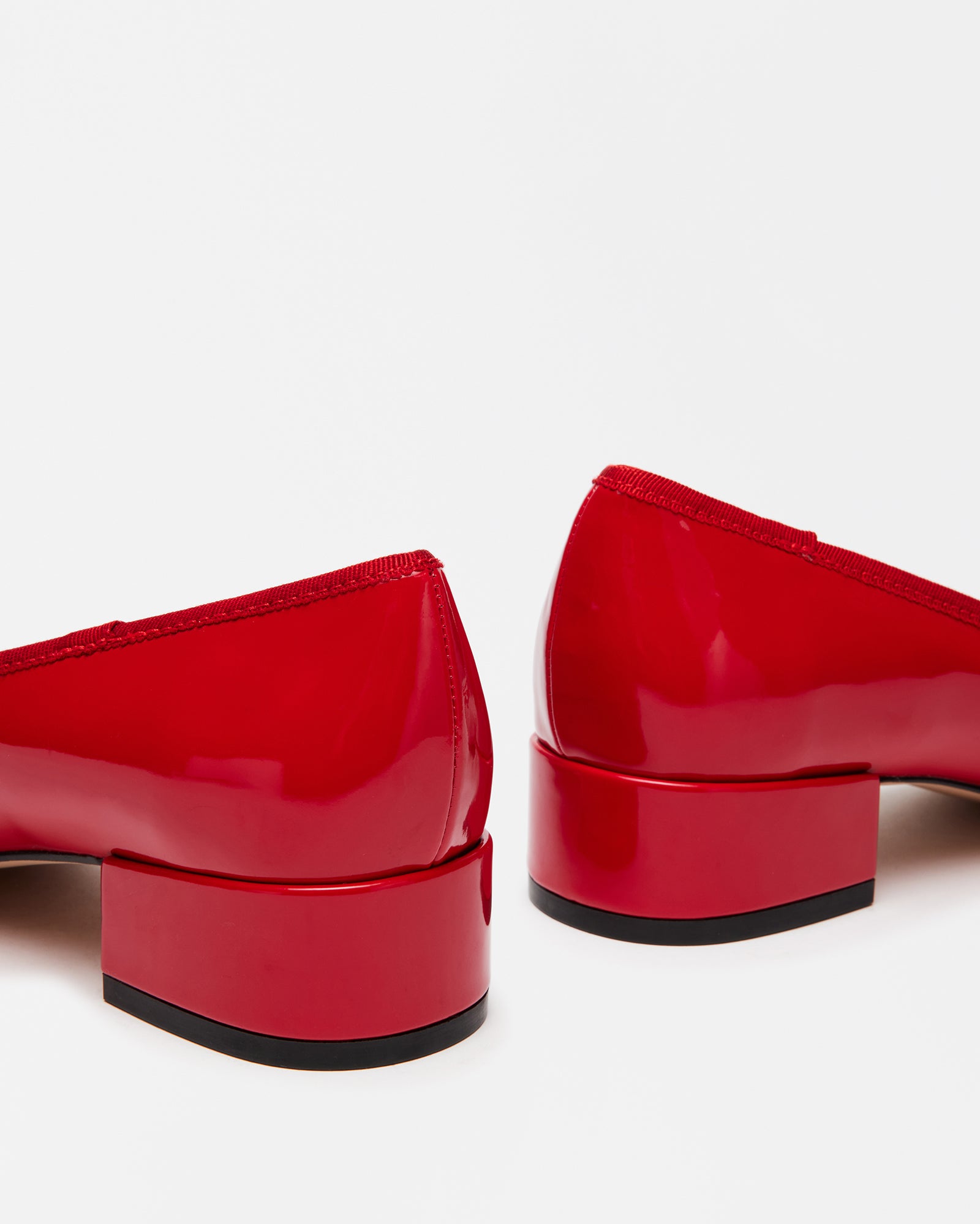 Back view of low heel shoes worn outdoors at a garden ceremony