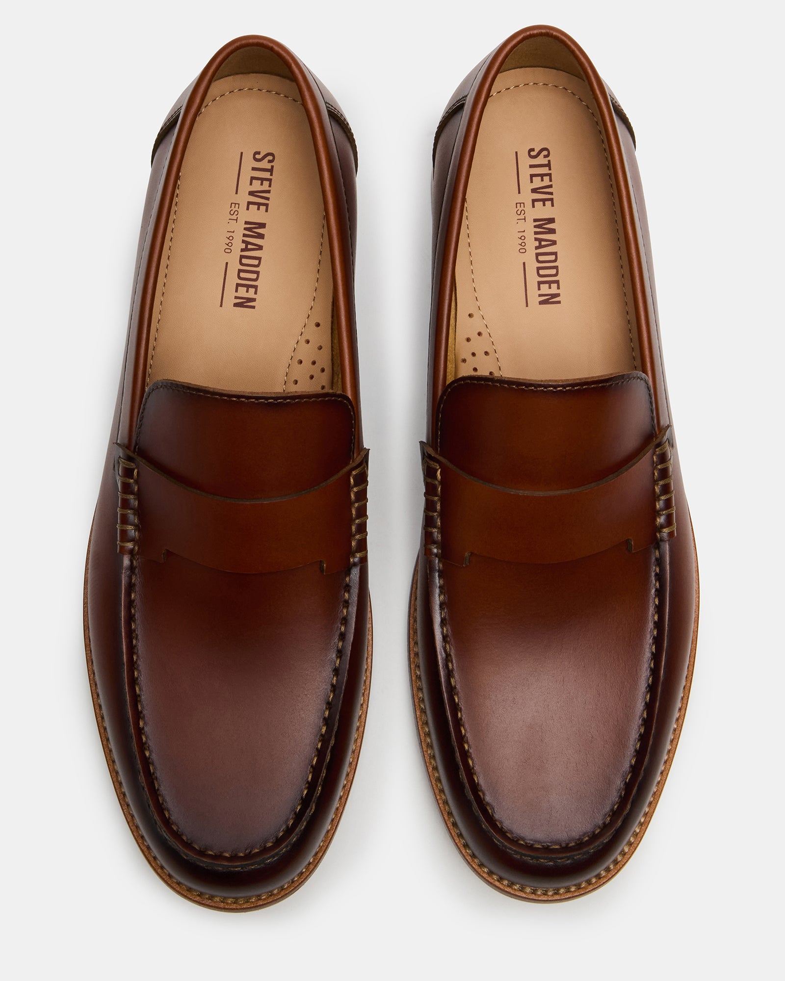 Close-up of the premium leather upper of mens suede loafers.