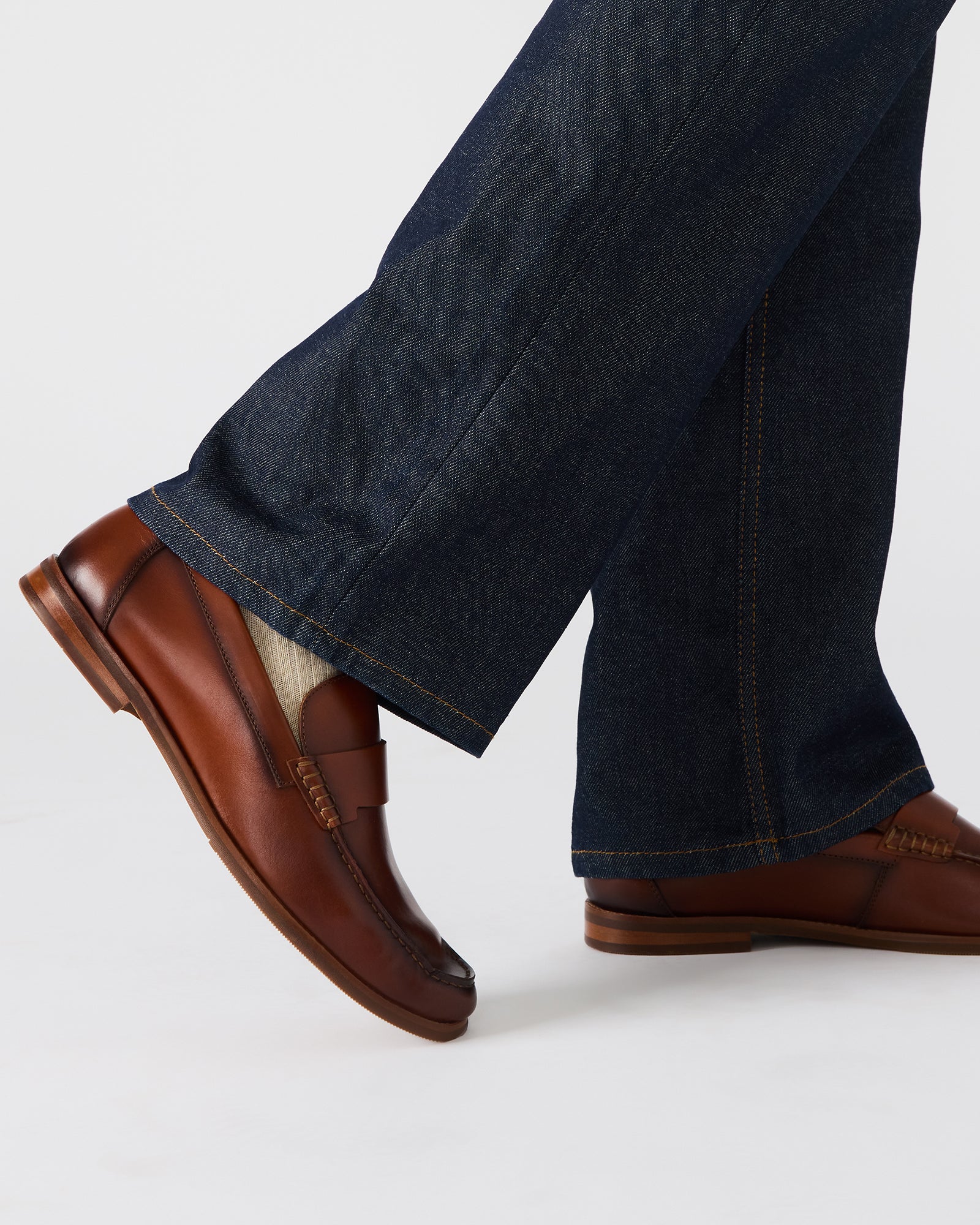 Close-up of the premium leather upper of mens suede loafers.