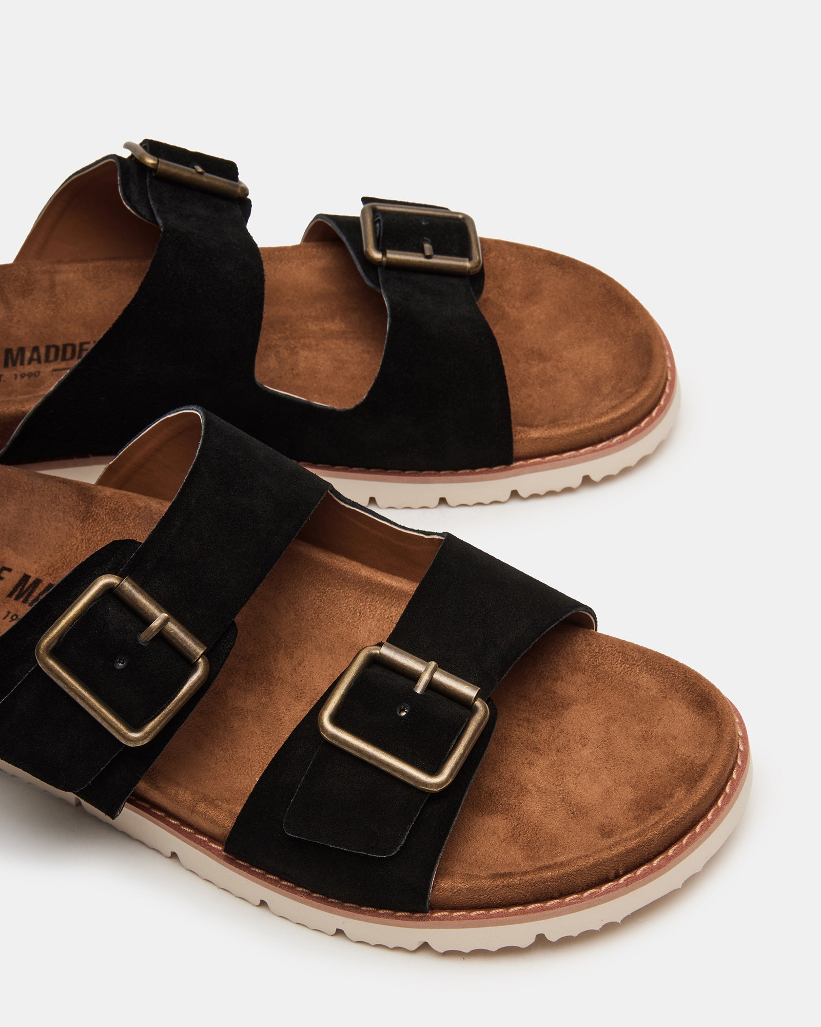 Sandals slides shoes womens on a summer day picnic blanket beside iced coffee