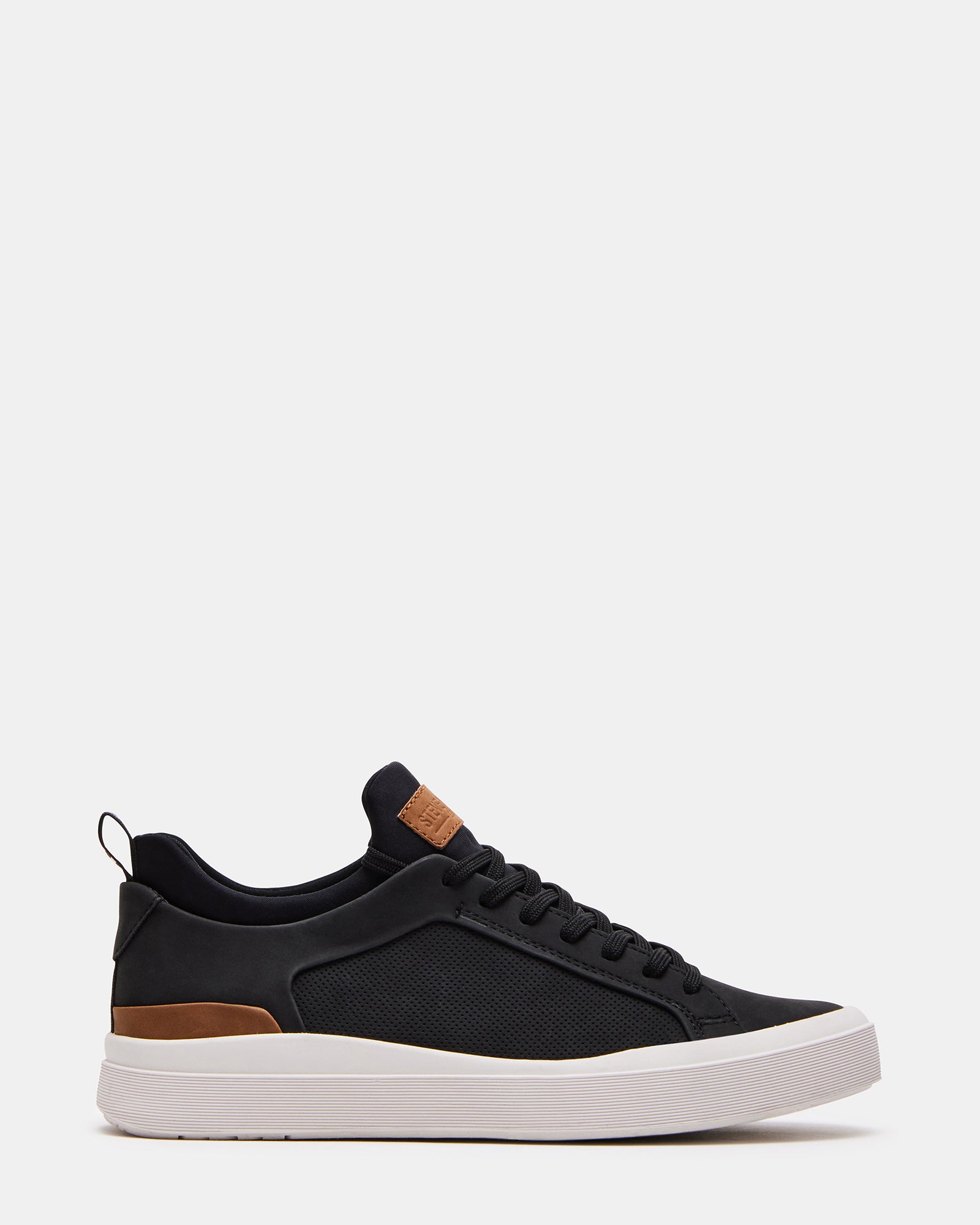 Dack Black low top sneakers front view on urban sidewalk