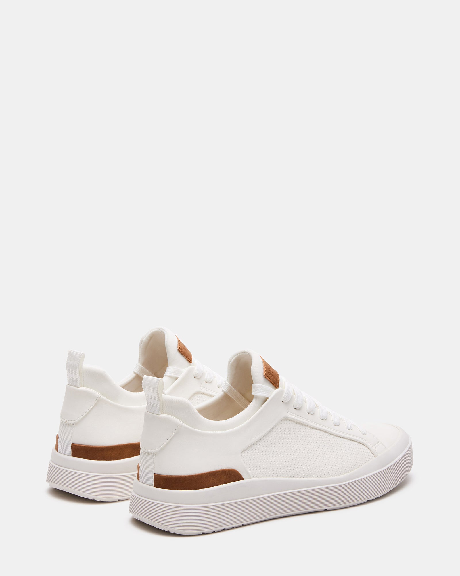 Mens white sneakers featuring a secure lace-up design