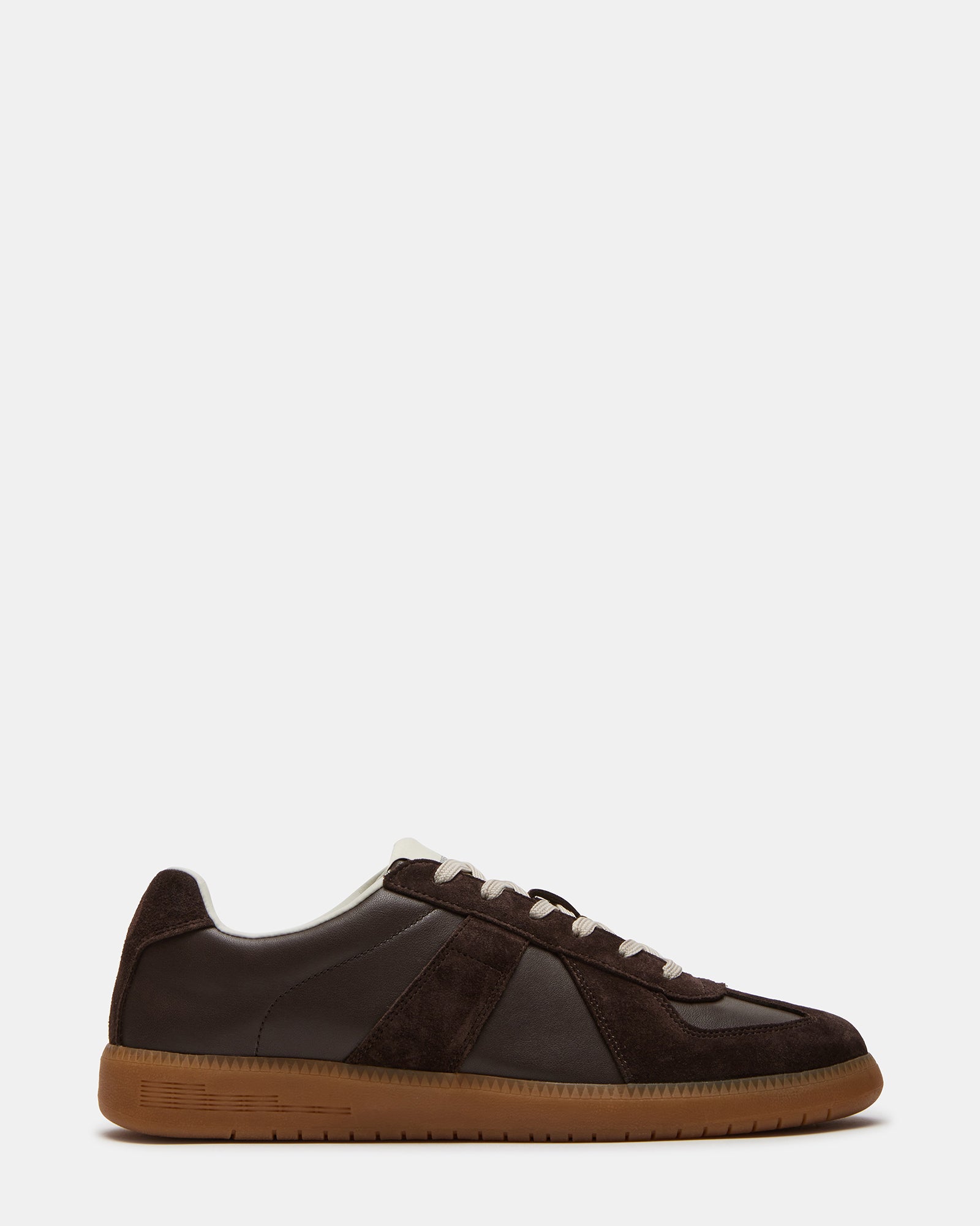 Top view of men's black sneakers showing lace-up detail and suede texture