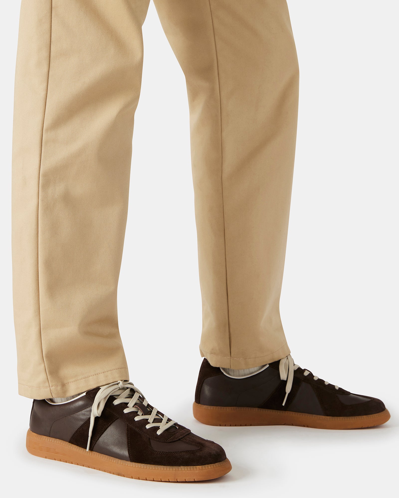 Side profile of low-top sneakers styled for NYC streetwear