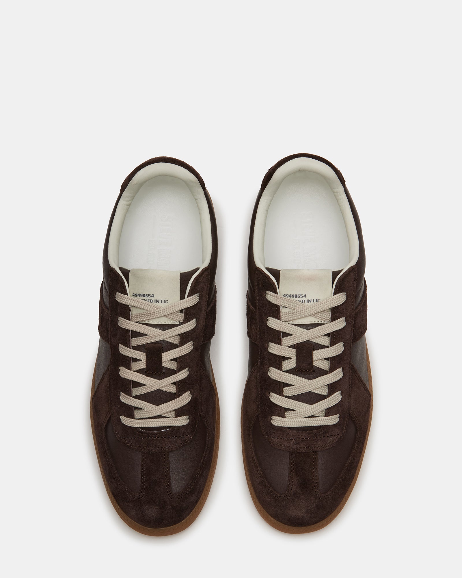 Side profile of low-top sneakers styled for NYC streetwear