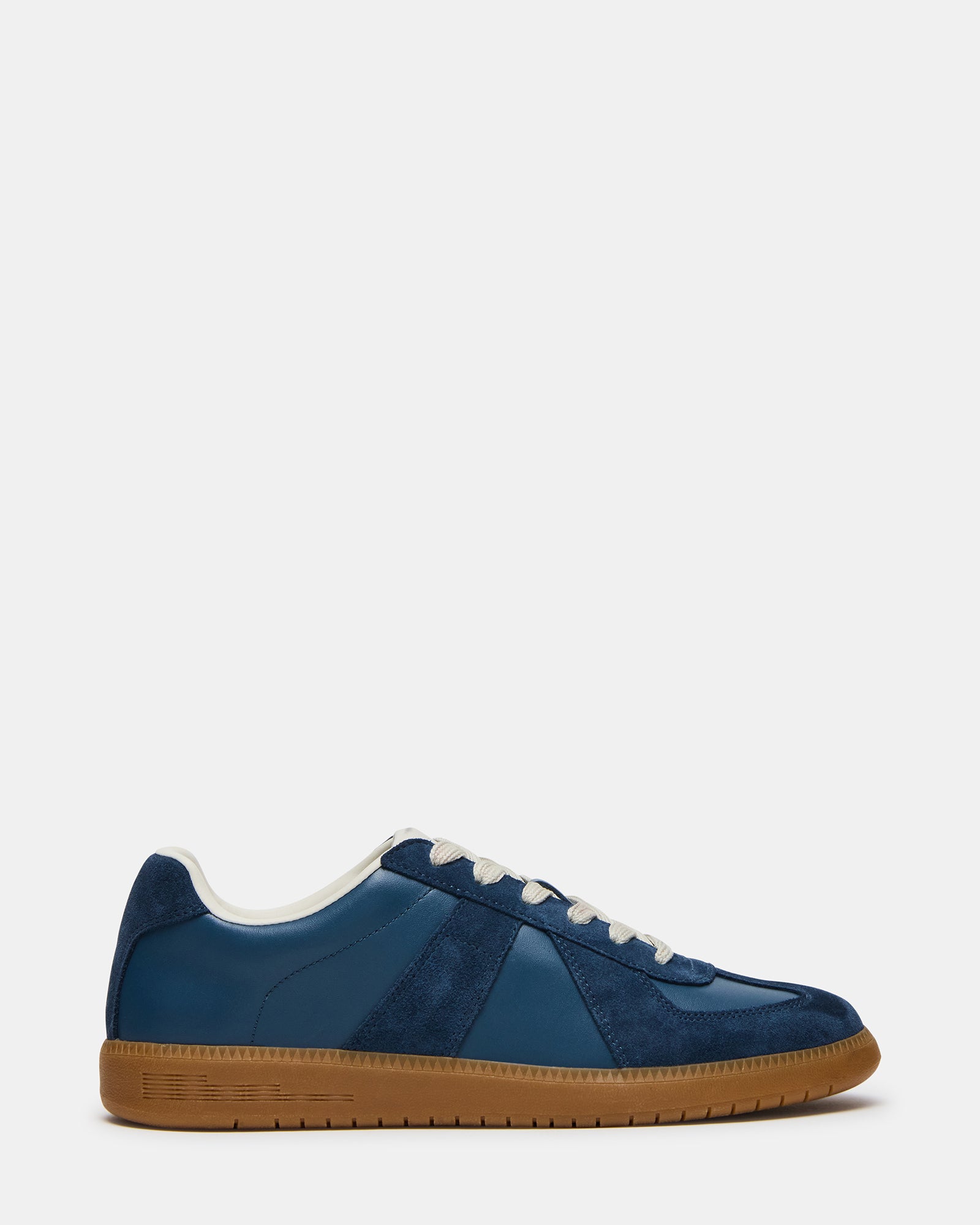 DIXON navy suede sneakers viewed from the side, highlighting the classic lace-up design.