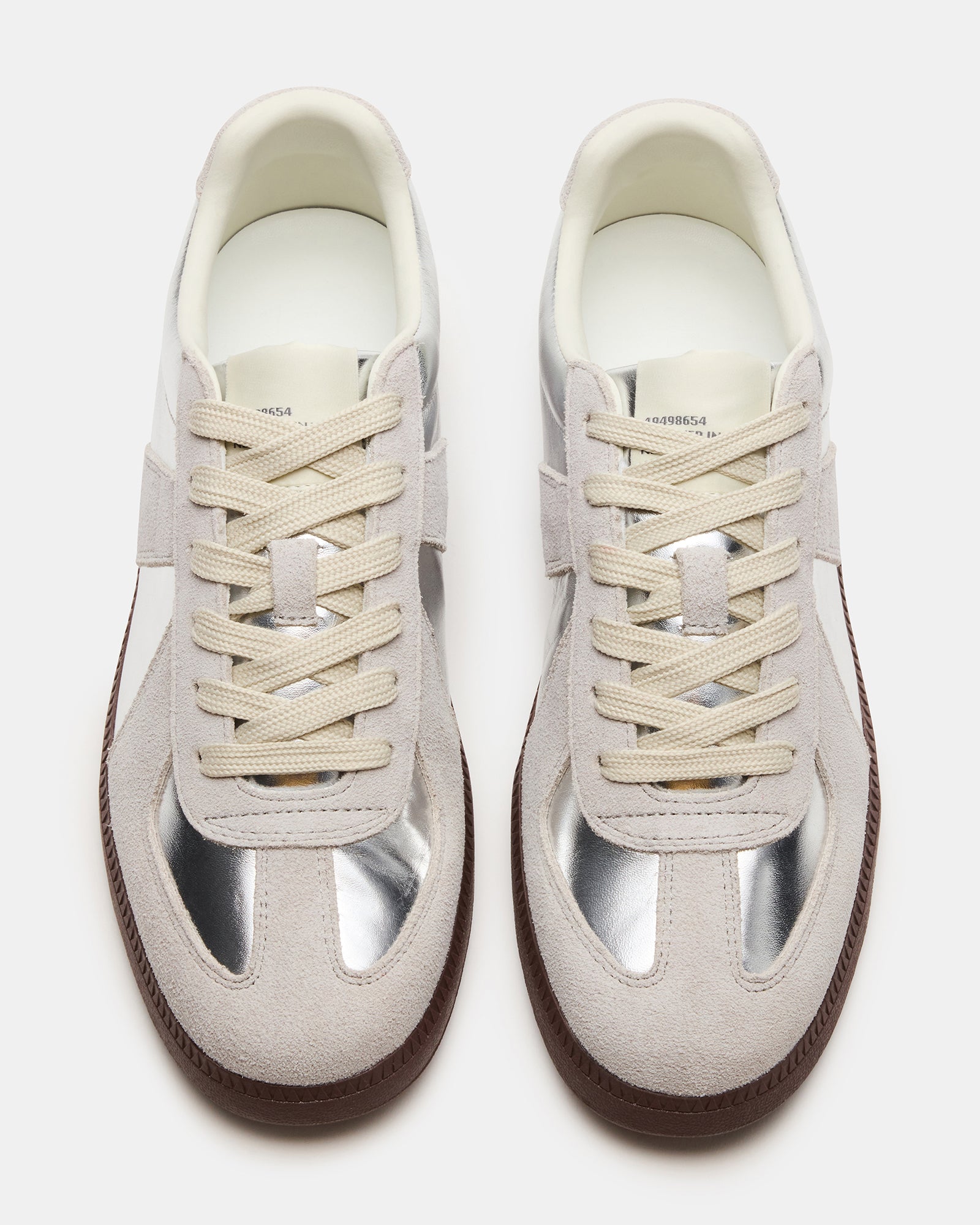 Close-up of lace-up detail on low-top sneakers