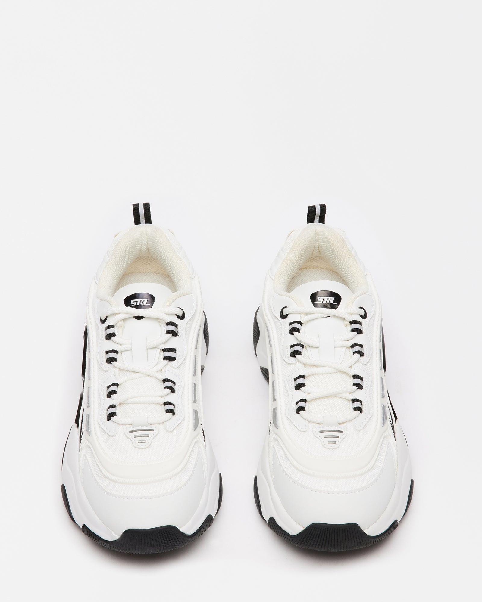 Close-up of the reinforced mesh upper and sleek vegan leather finish