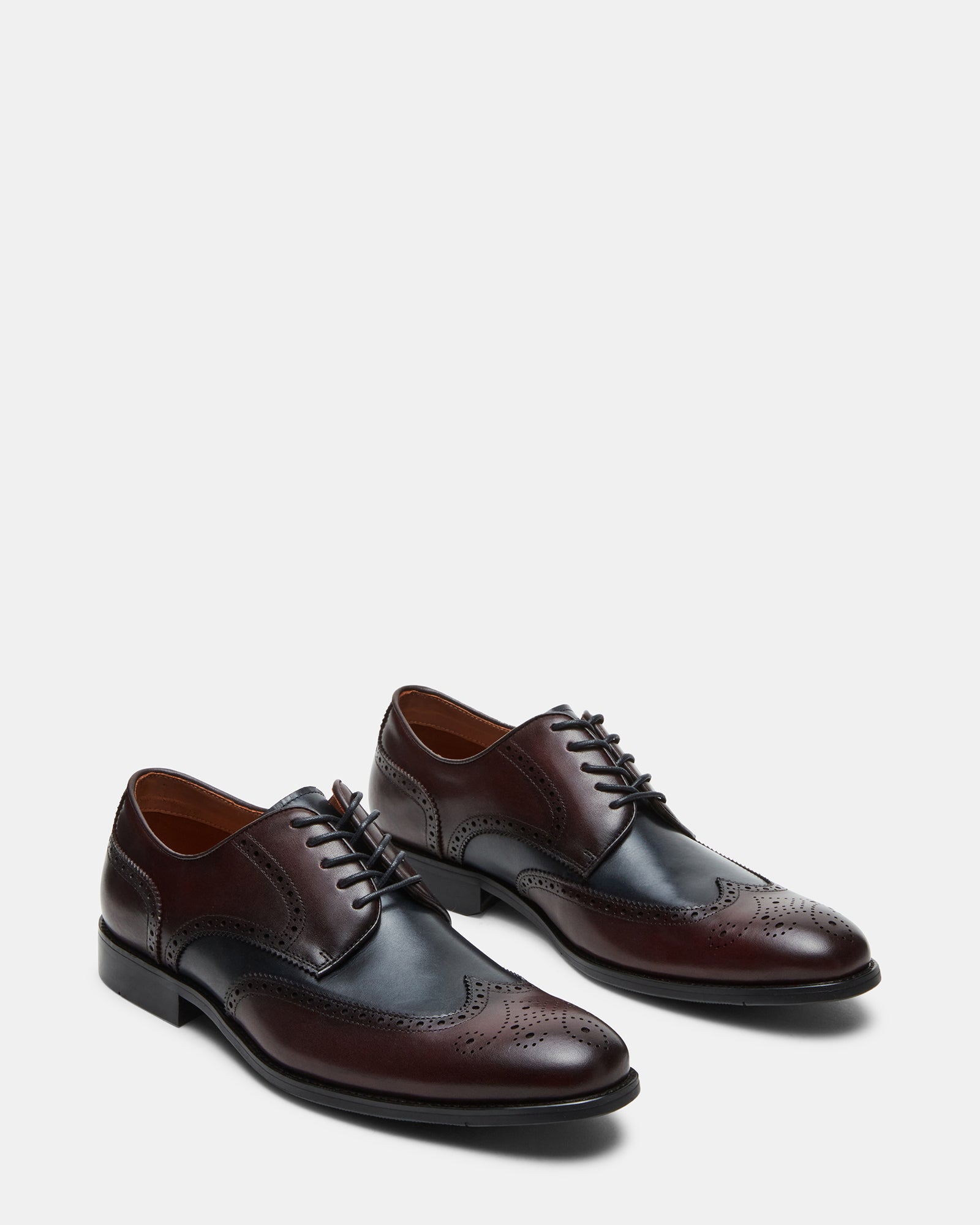 Close-up of burgundy dress shoes heel and stitching for premium look.