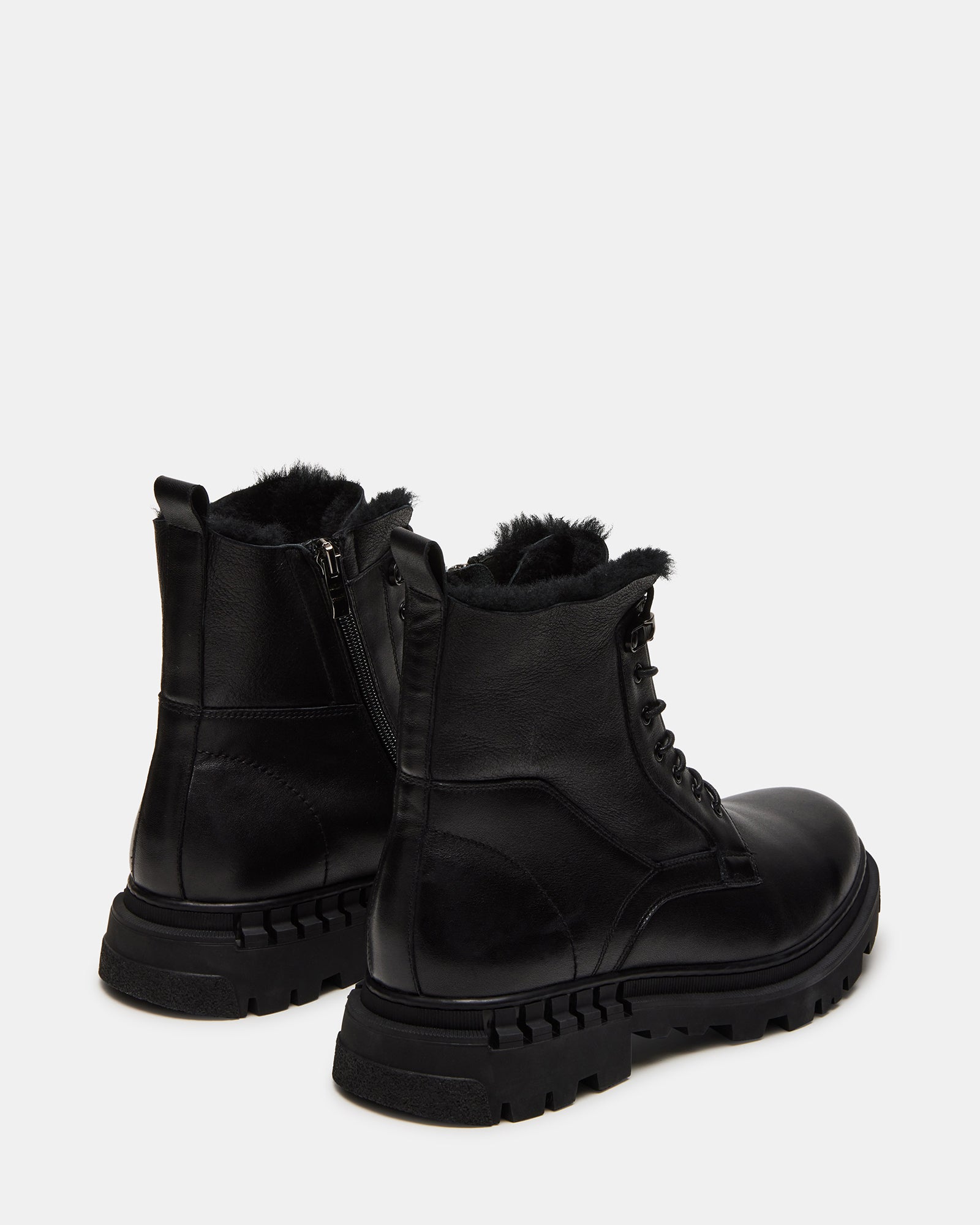 Close-up of faux fur lining inside stylish ankle boots for men