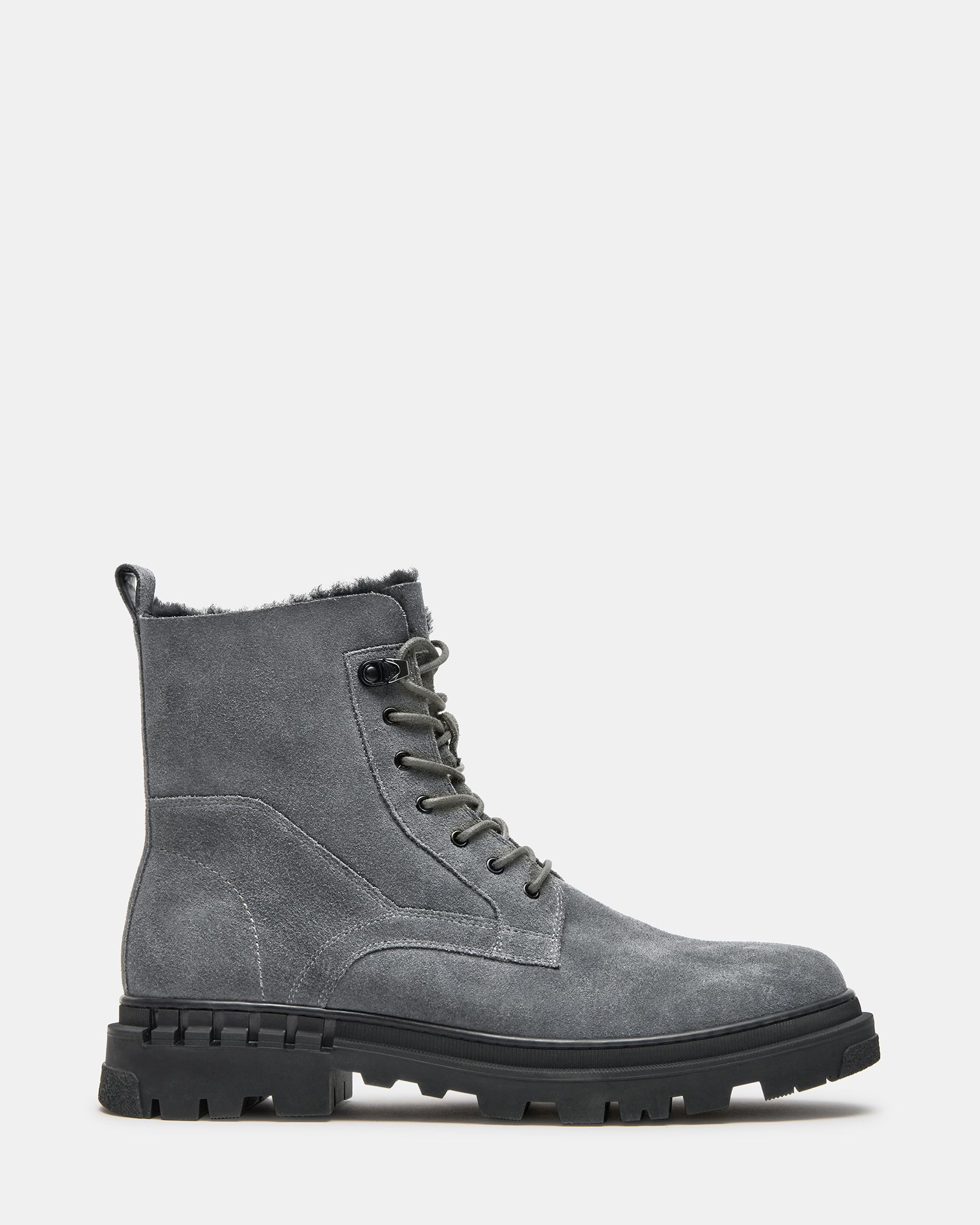 Side view of grey suede cowboy boots with lace-up and zip closure