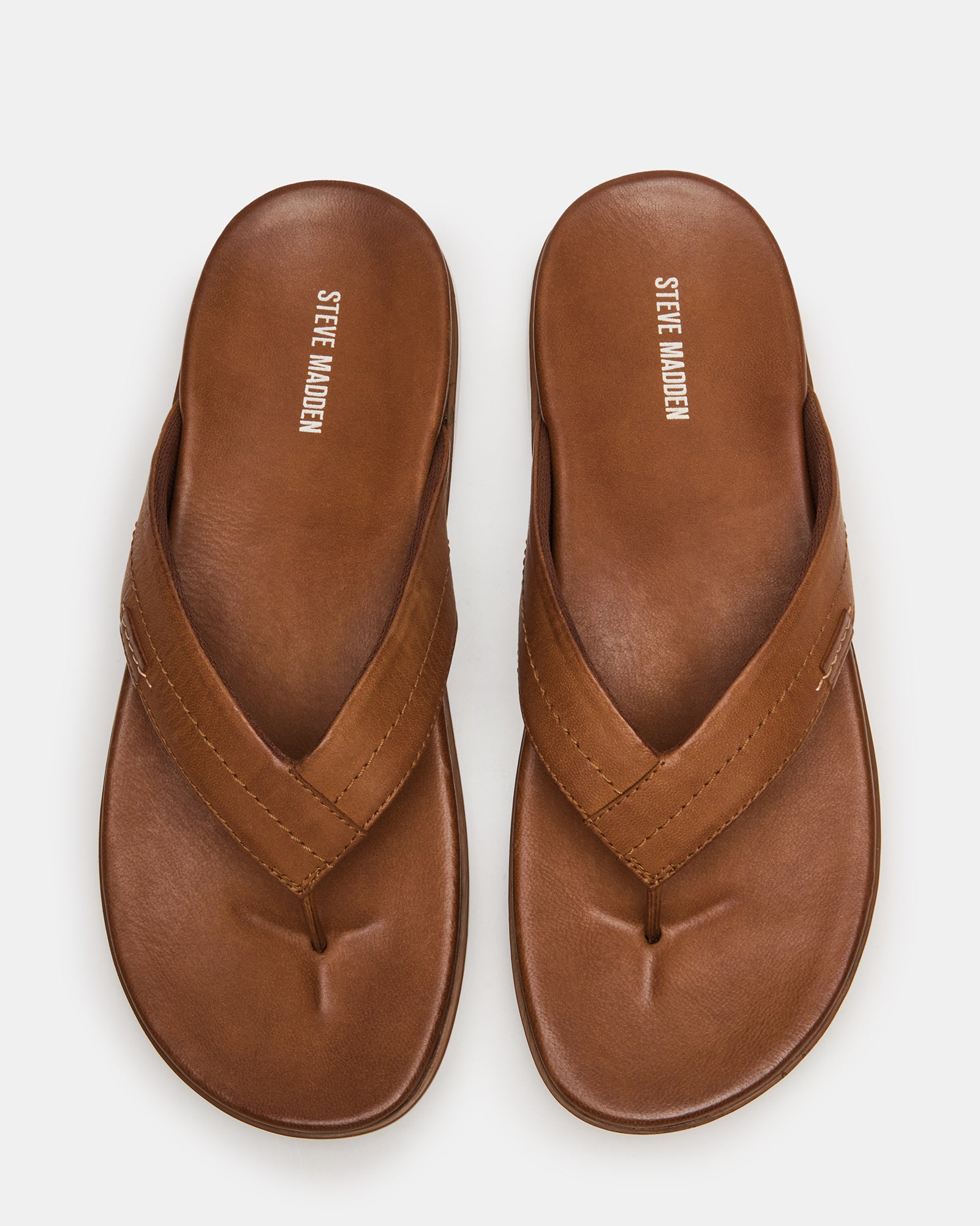 Side view of EMMETT brown leather sandals, ideal for casual wear.