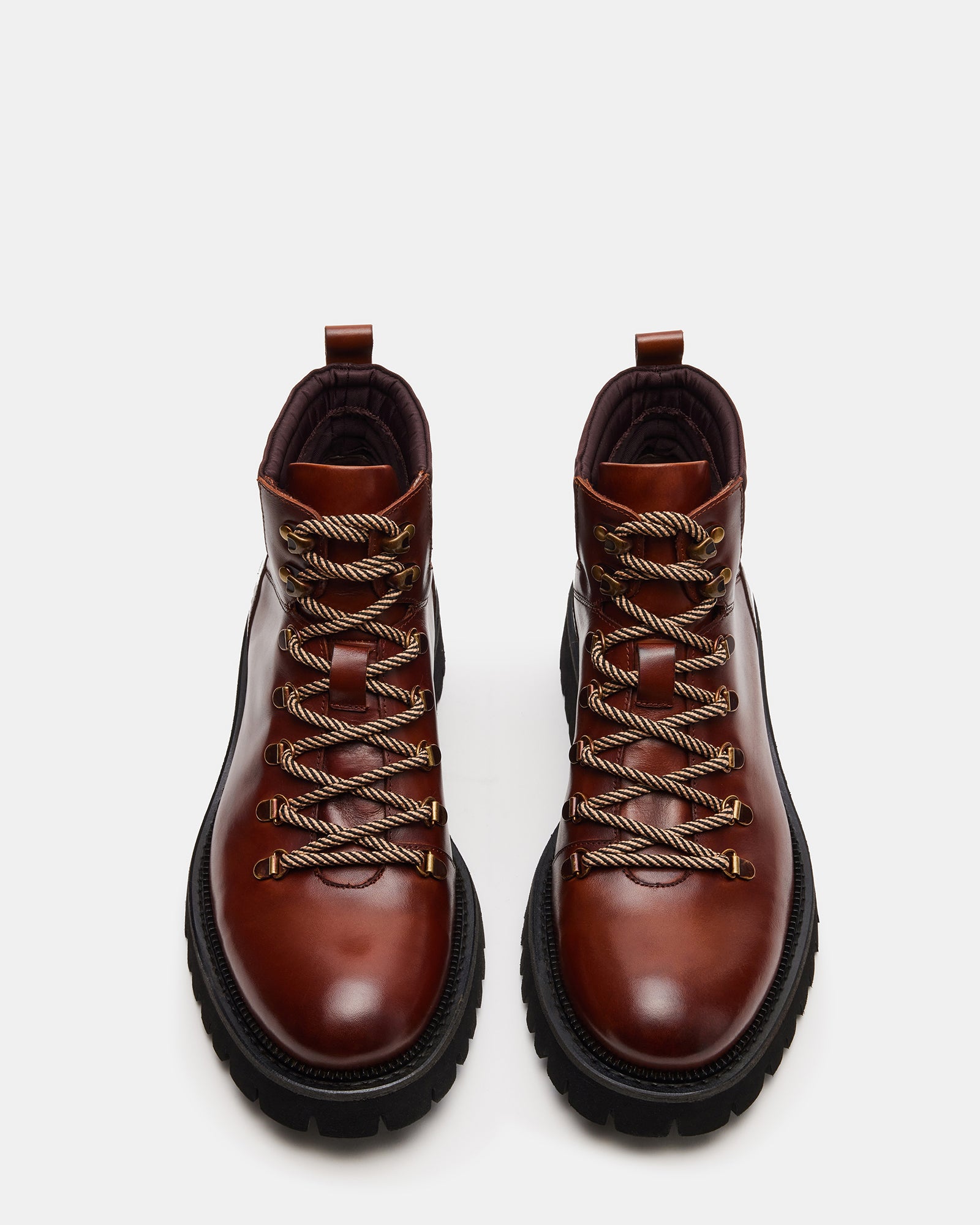 Side view of Fergus black leather work boots highlighting lace-up design and textured sole
