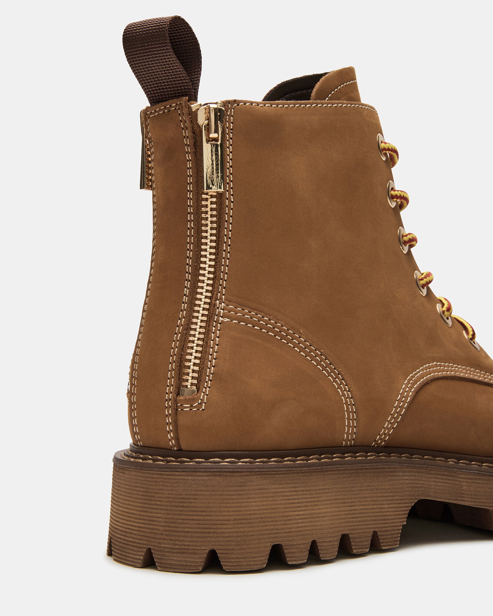 Back view of Fintan Lace-Up Boots featuring the double zipper and pull tab.