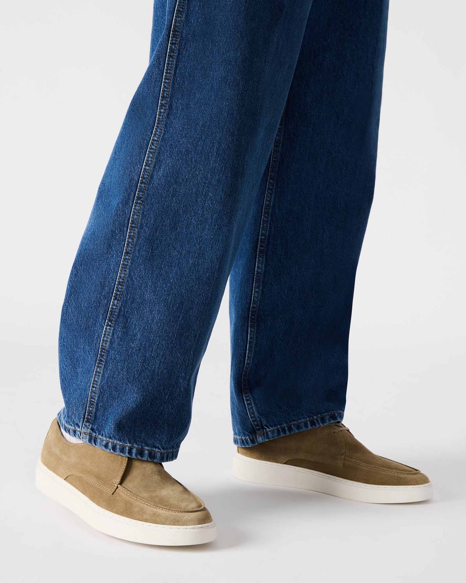 Top-down view highlighting lace-up design and soft textile lining