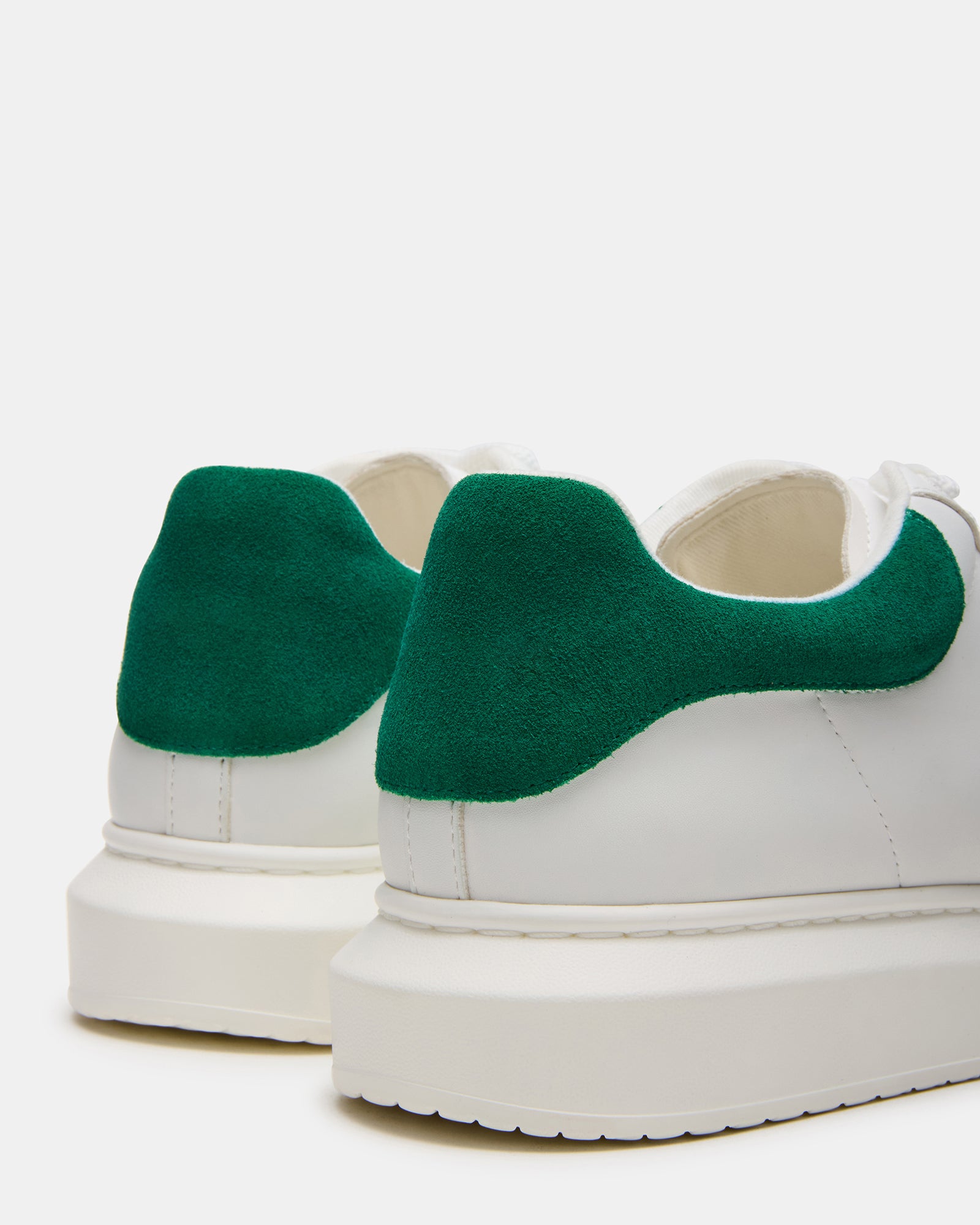 Side view of Frosted Green Multi Bottega sneakers showing platform sole and lace-up design